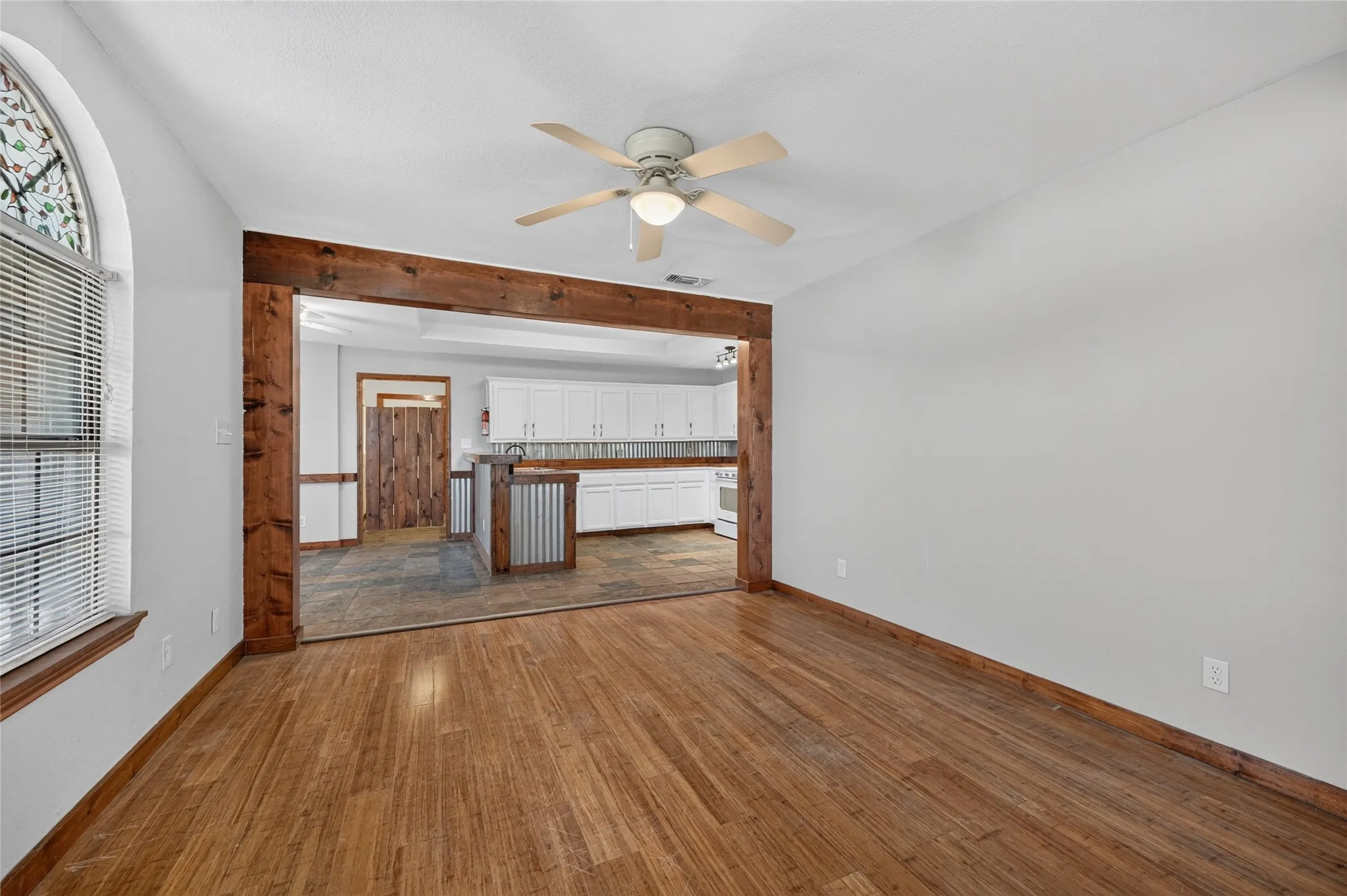 Wood-finish flooring with a ceiling fan
