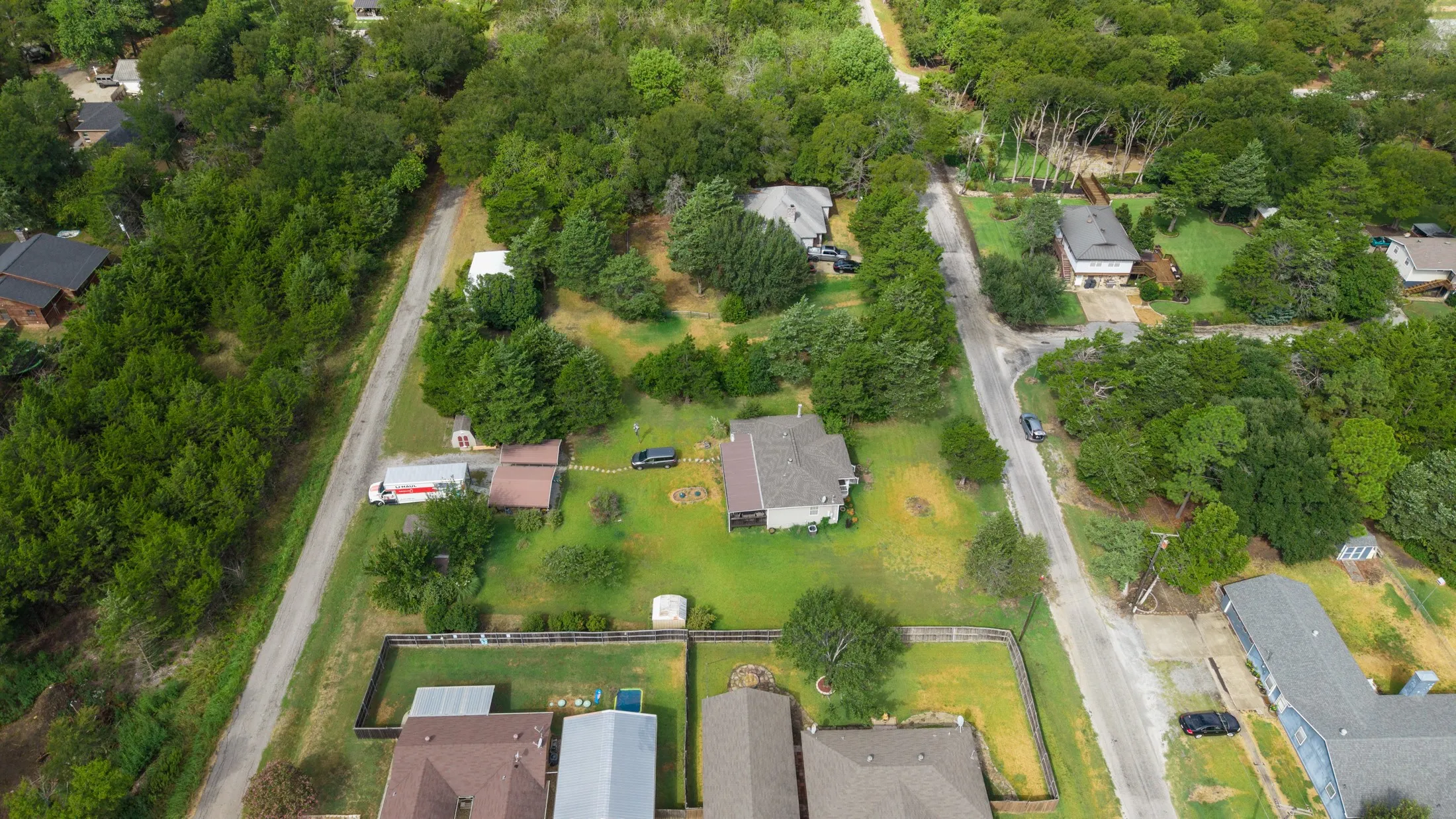 Expansive lot with mature trees and a detached structure