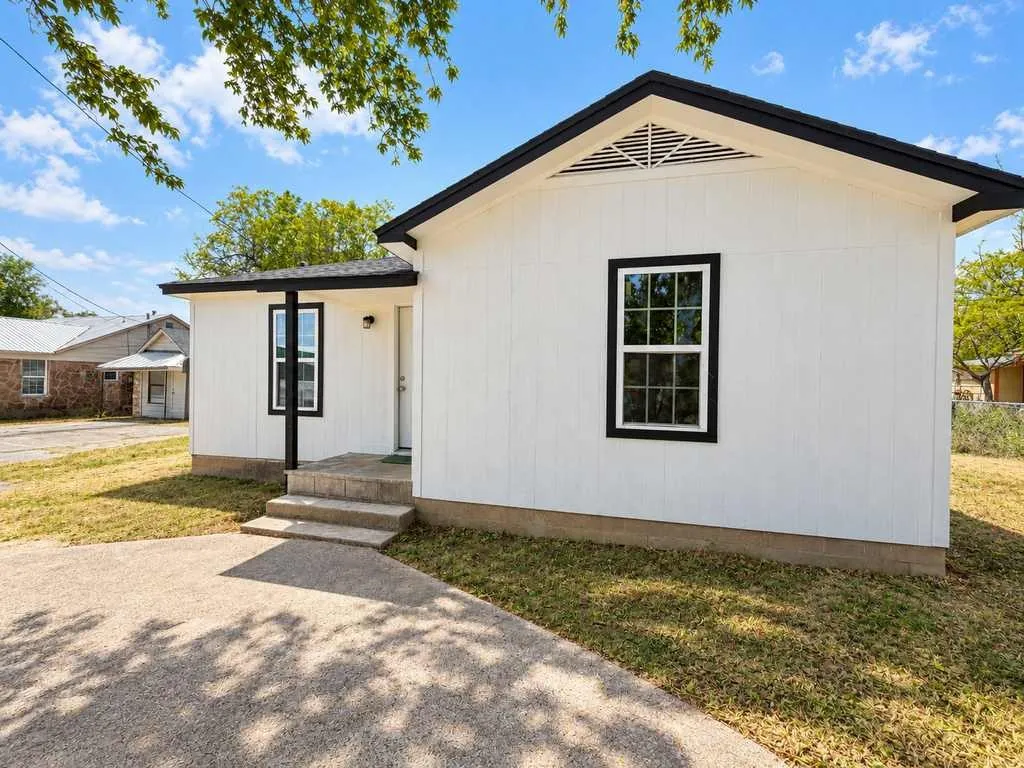 Alternate exterior view of the separate second home and its entry.