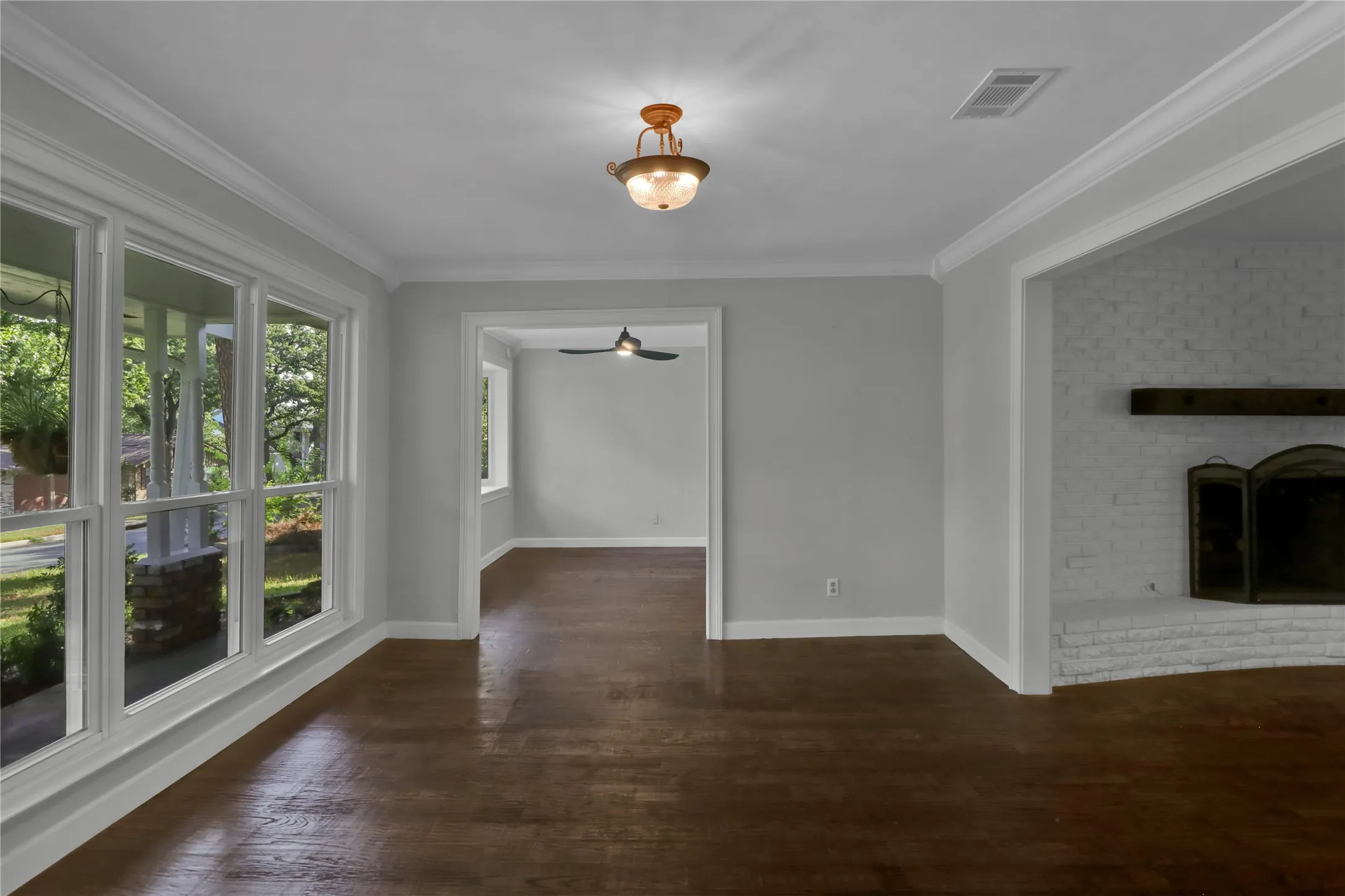 Formal living leads straight to dining room and to the right is the family den space.