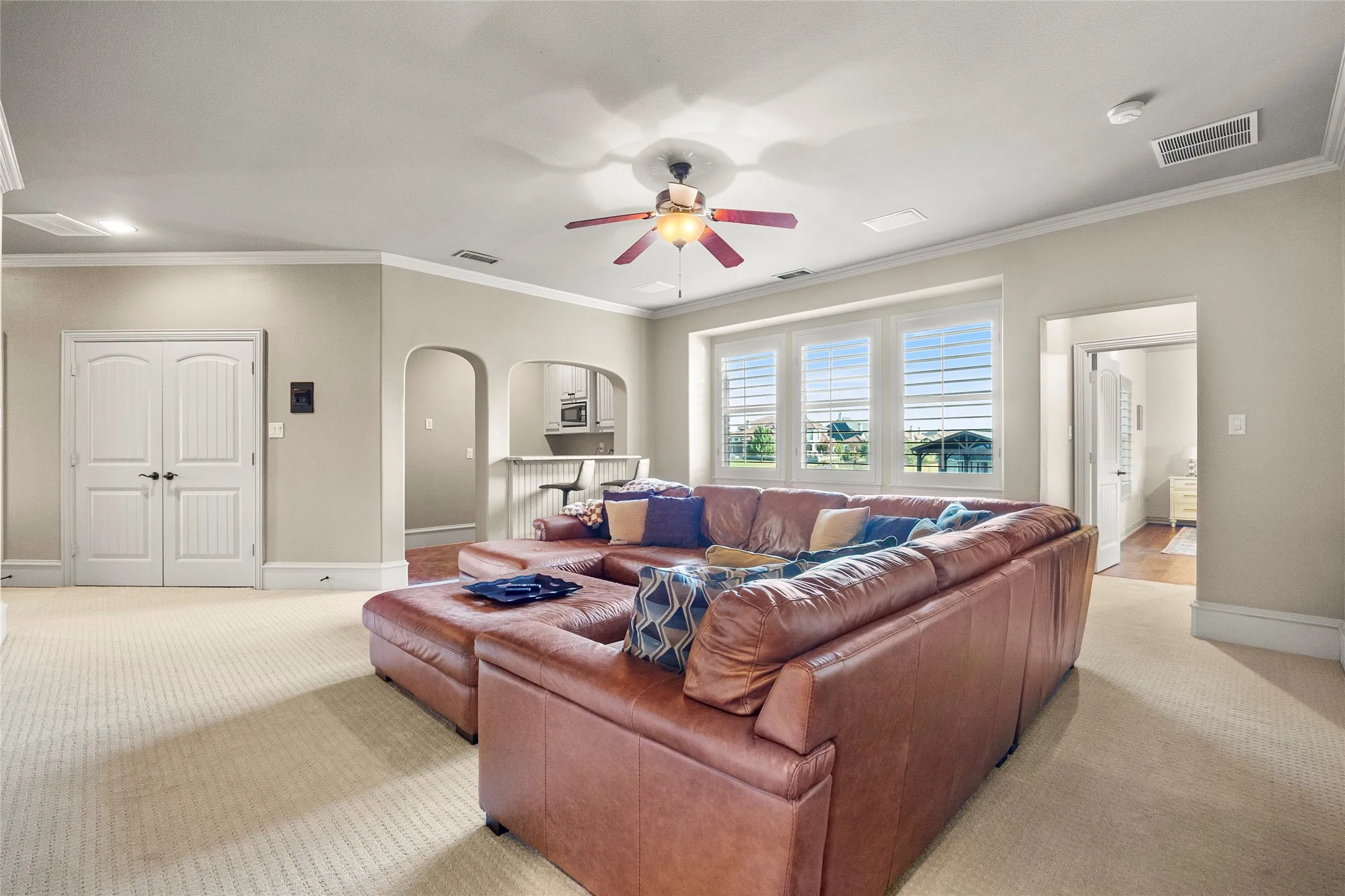 Upsairs family room with a wet bar