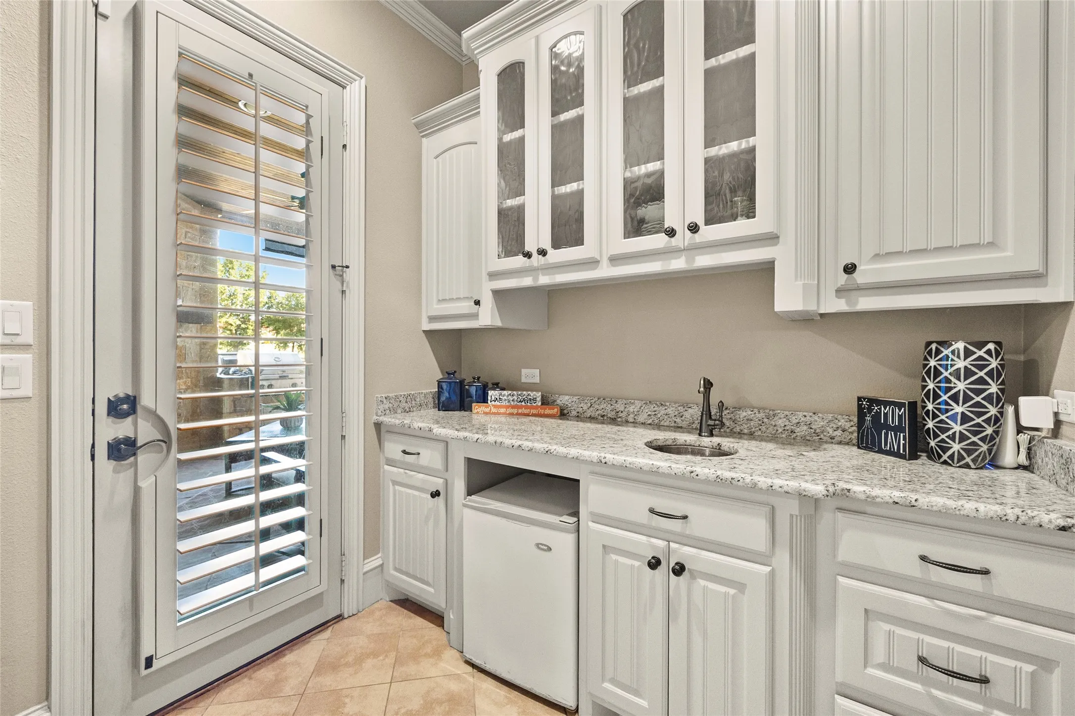 Coffee bar in the primary suite with access to patio