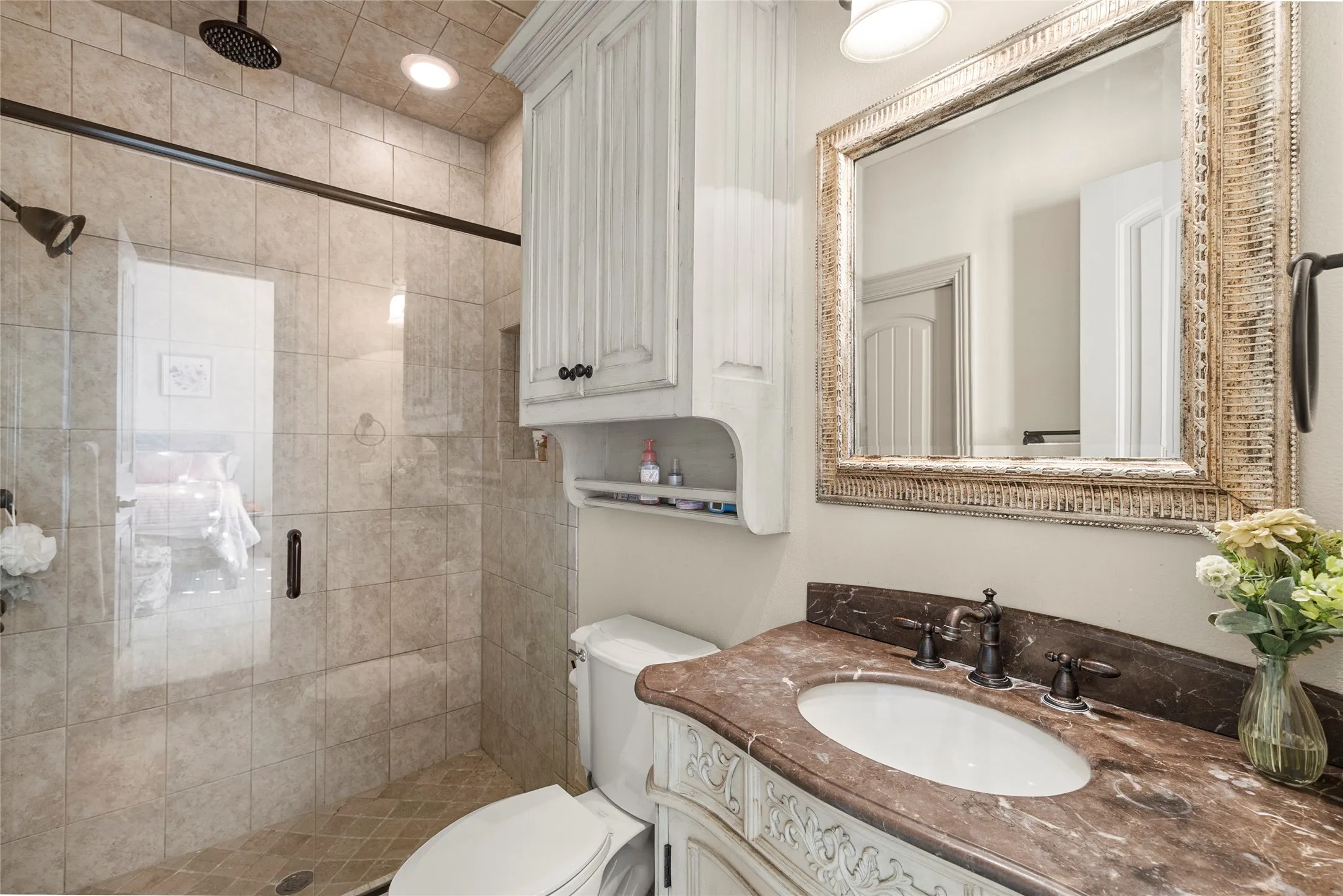 Upstairs bath. Closet contains a built-in vanity/desk