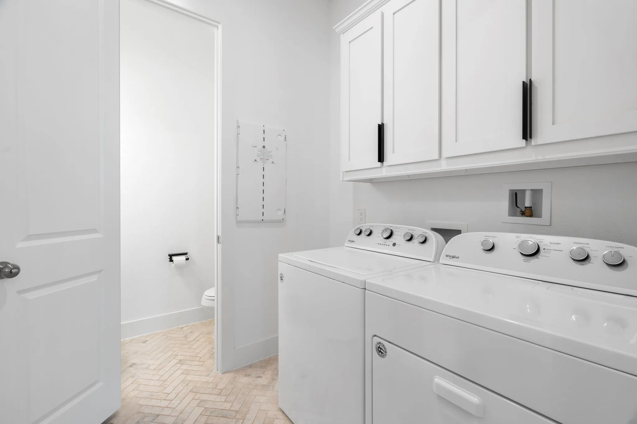 Laundry and half bath downstairs