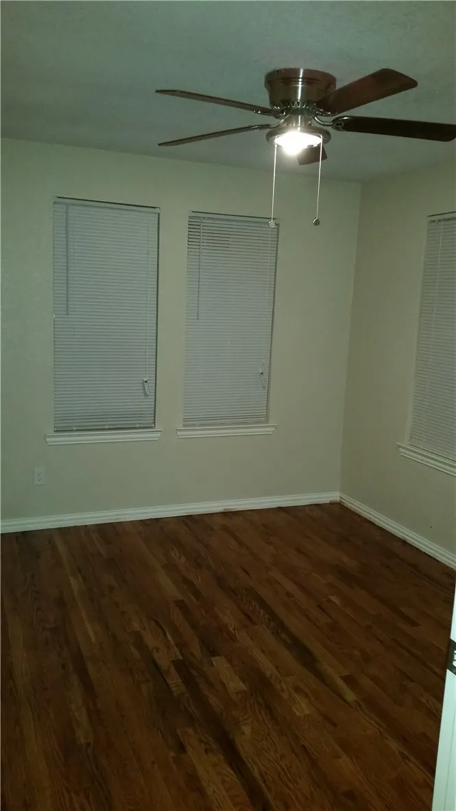 bedroom with lots of windows
