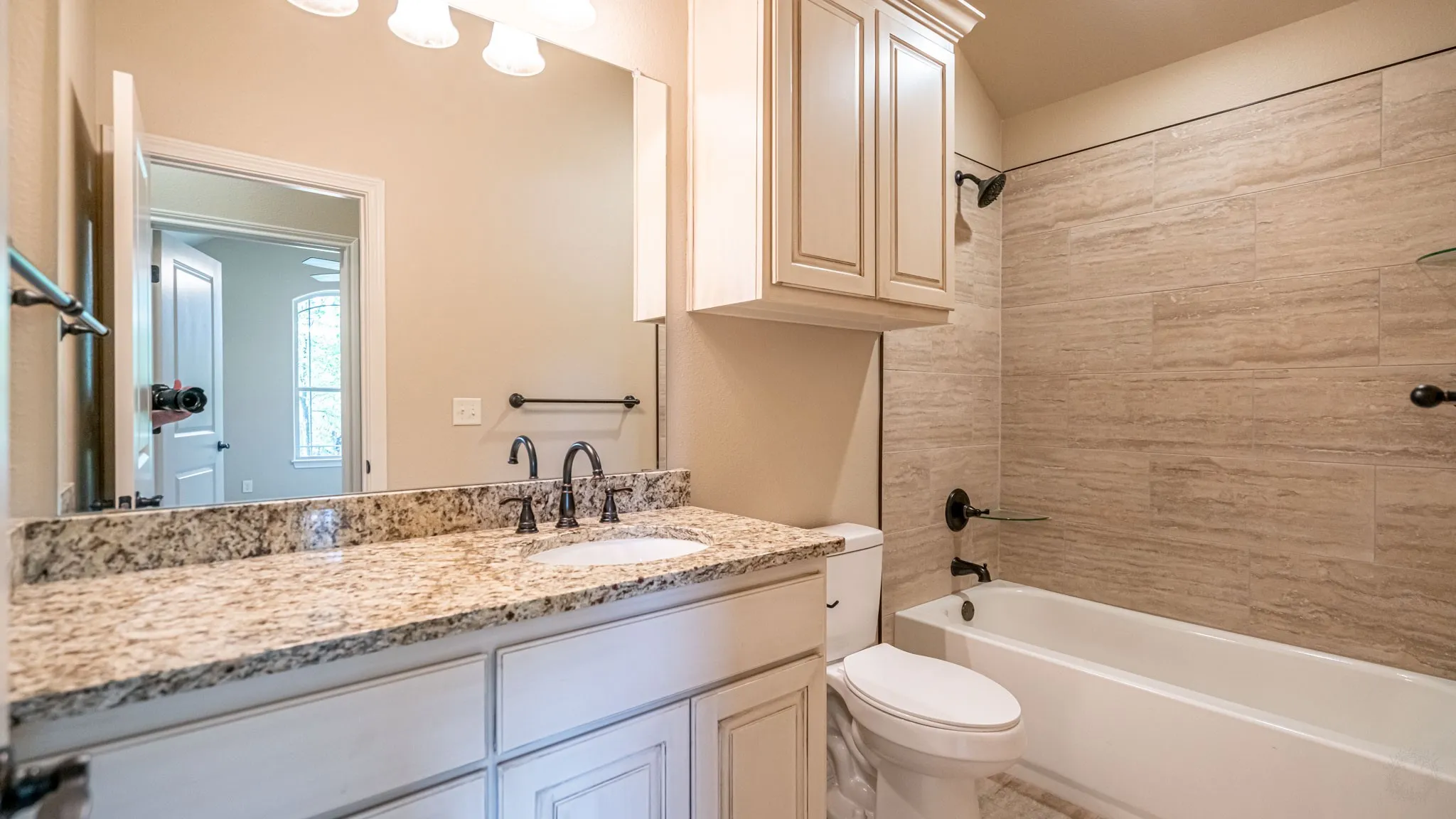 Secondary bathroom with shower tub combo