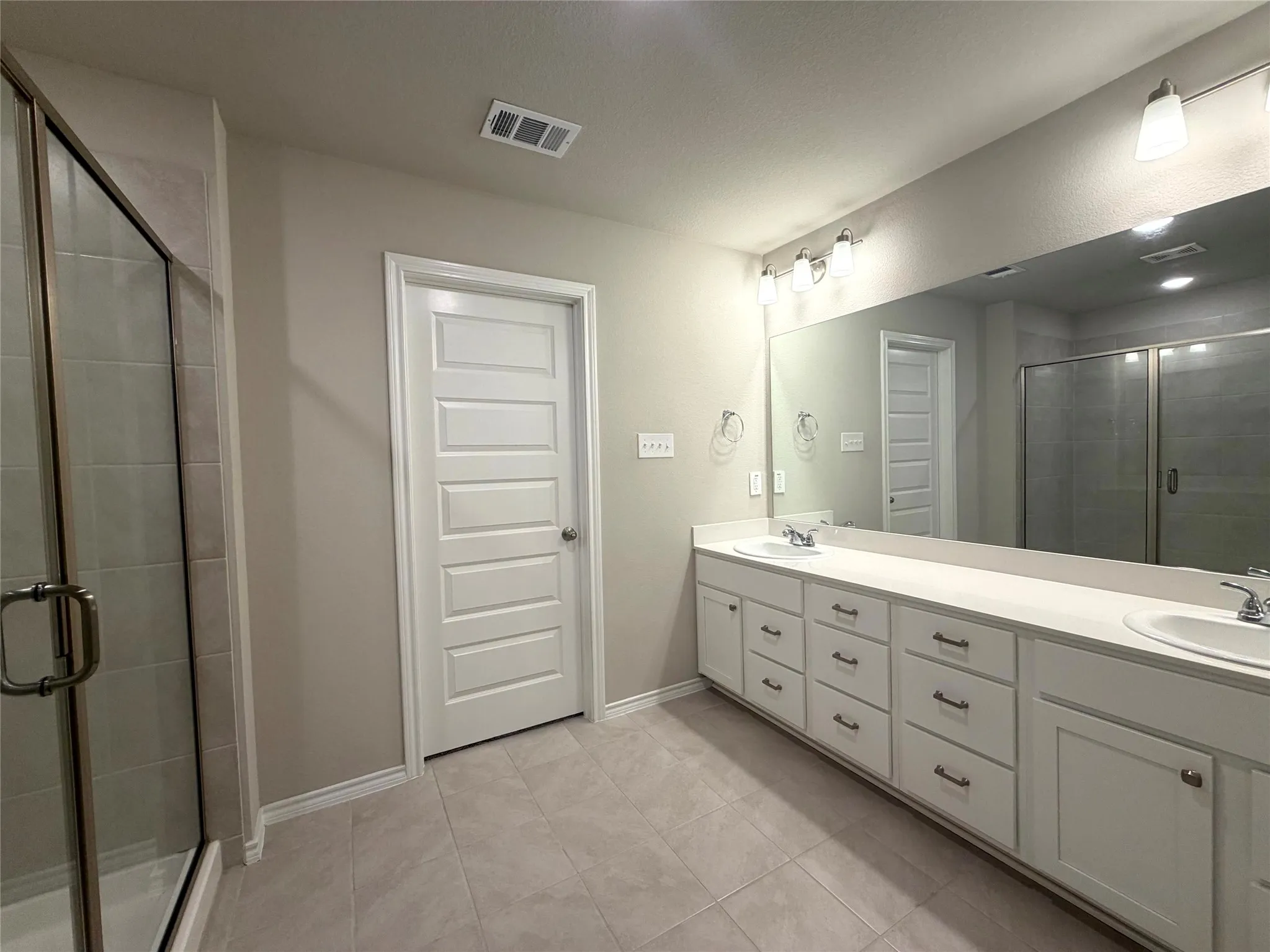 Expansive vanity with dual sinks and ample storage