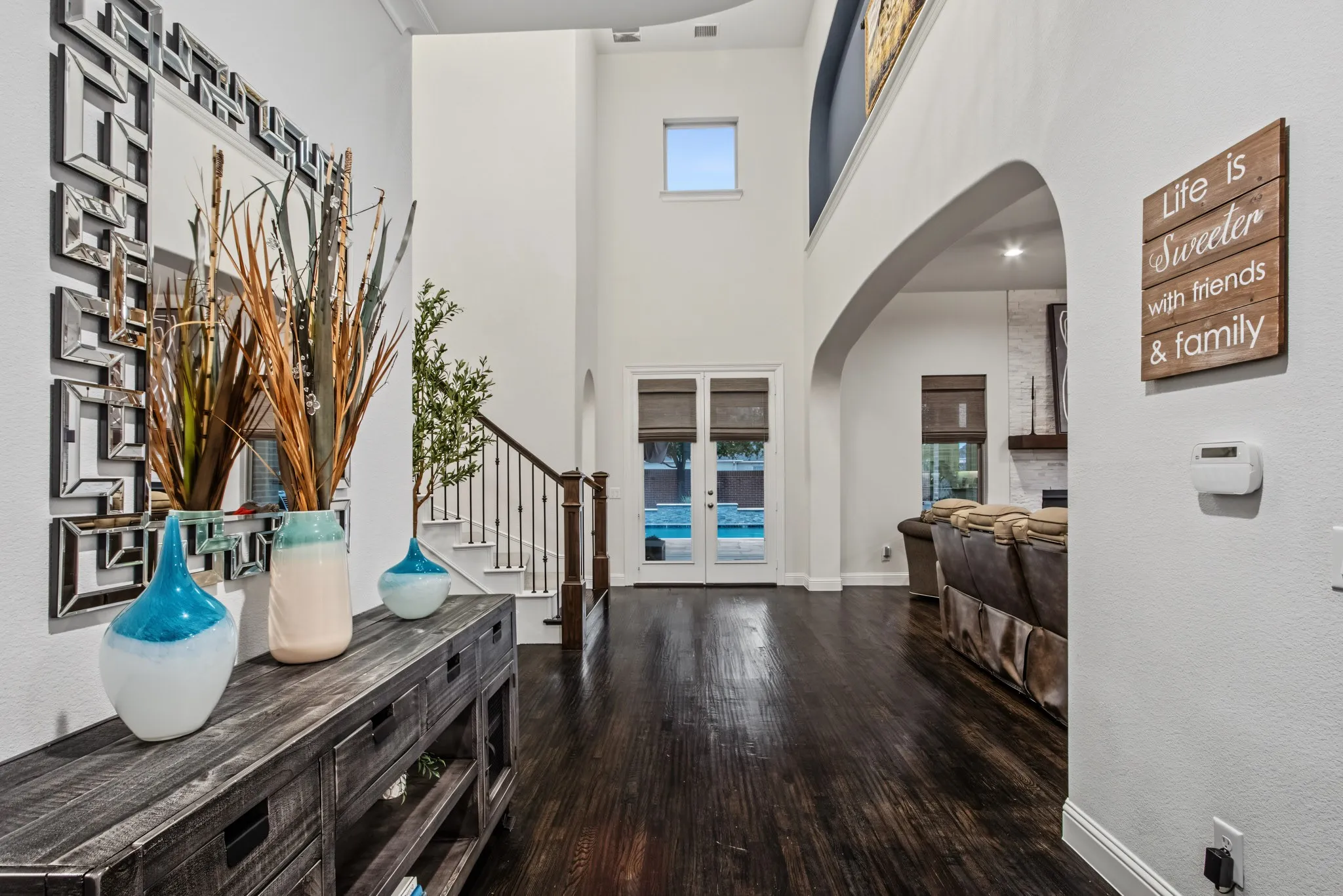 Foyer features hardwood floors & soaring ceilings!