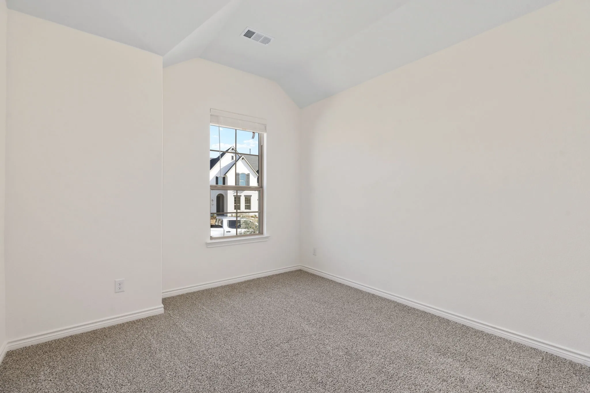 The secondary bedrooms are generously sized, each with their own design features.
