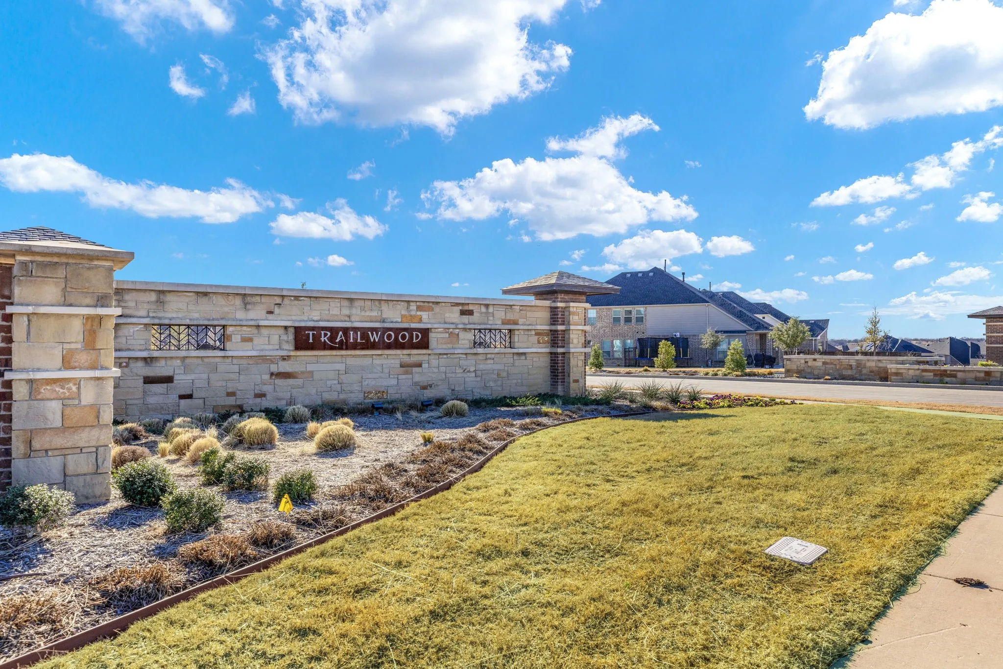 Trailwood community offers an open view to green space, trails, 45 acres of open space, a trail along the bank of the creek as well as an amenity center and park amenities.