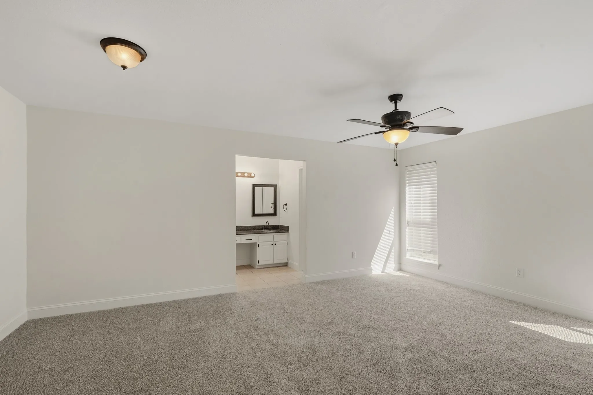 Spacious primary bedroom.