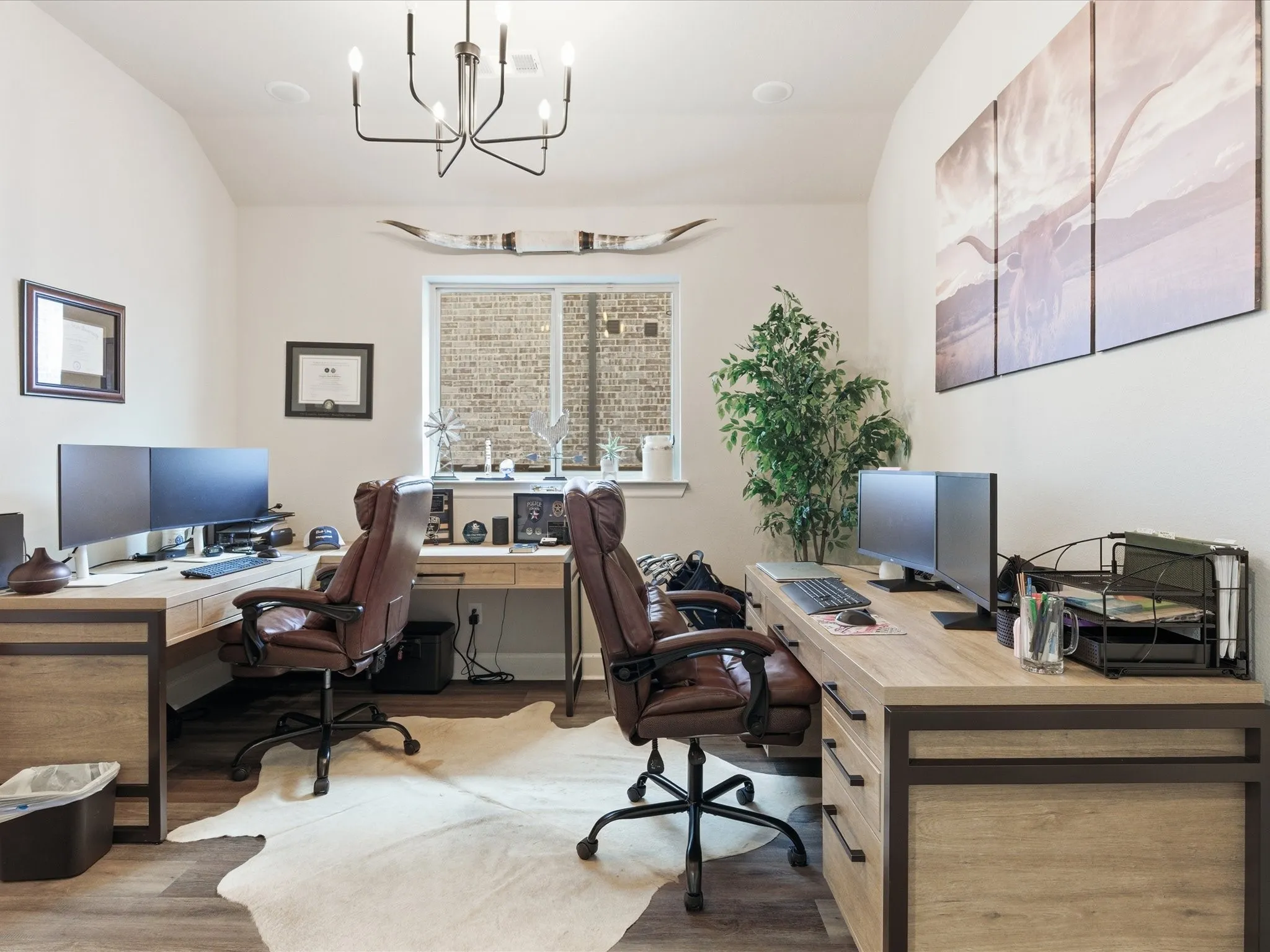 spacious office area featuring two dedicated workspaces, offering plenty of room to work, study, or manage everyday tasks side by side