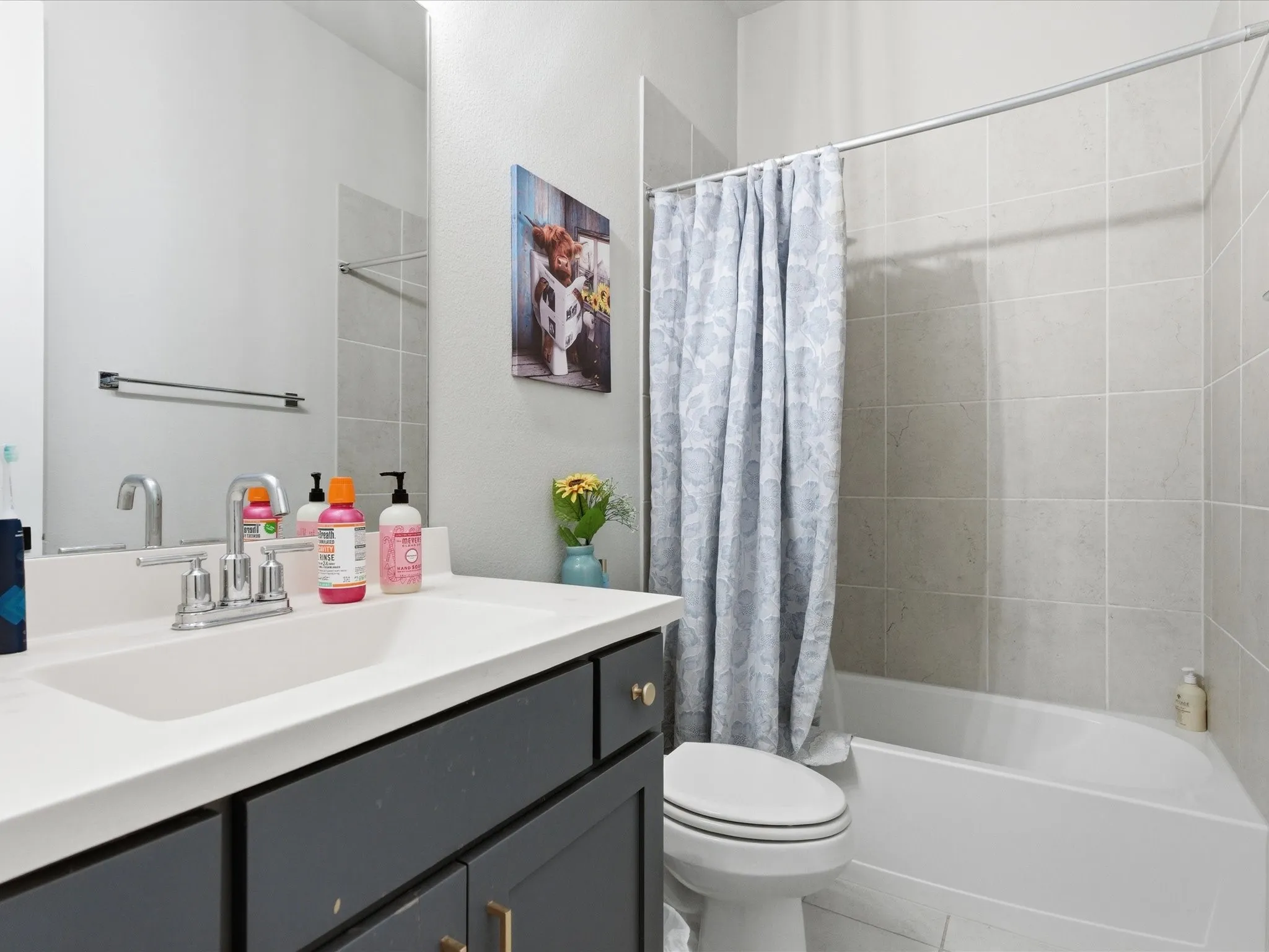 well-appointed bathroom featuring a relaxing bathtub, offering a comfortable space to unwind and enjoy a refreshing soak
