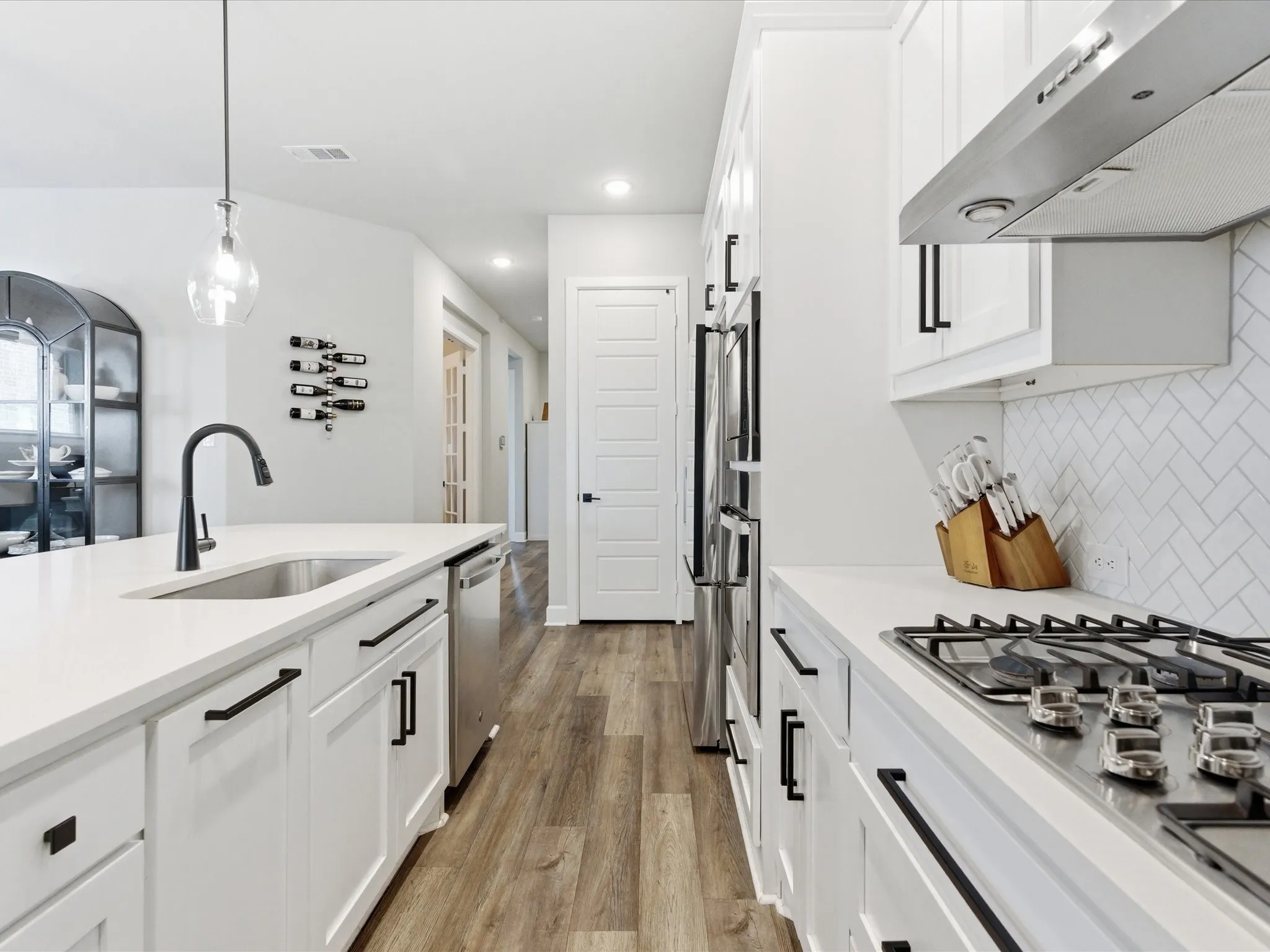 spacious kitchen offering a functional gathering spot for meal preparation, casual dining, and entertaining