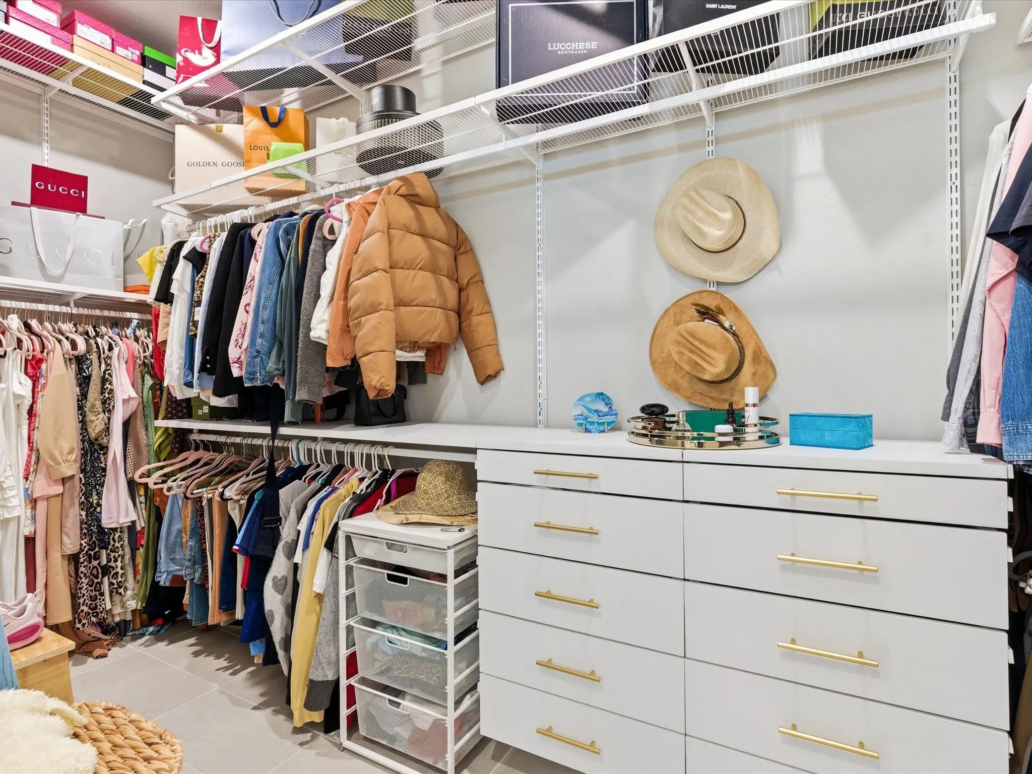spacious walk-in closet with ample room for organizing clothing, shoes, and accessories, creating a stylish and convenient dressing space