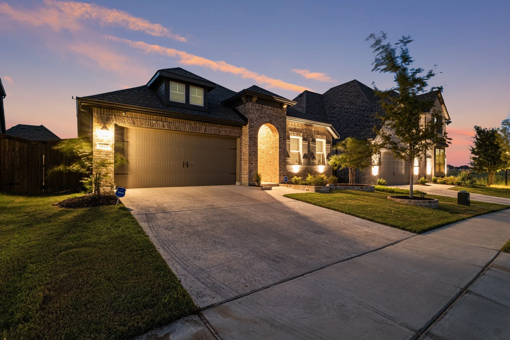 welcoming front exterior showcasing the home’s attractive architecture, well-defined entryway, and inviting curb appeal