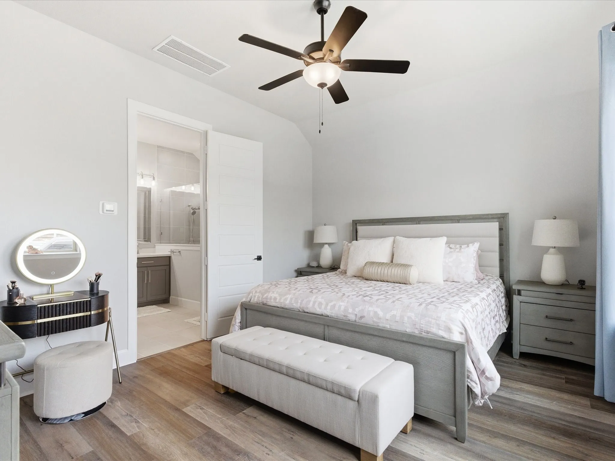 serene and inviting bedroom with a spacious feel, creating a comfortable retreat to unwind, relax, and recharge at the end of the day