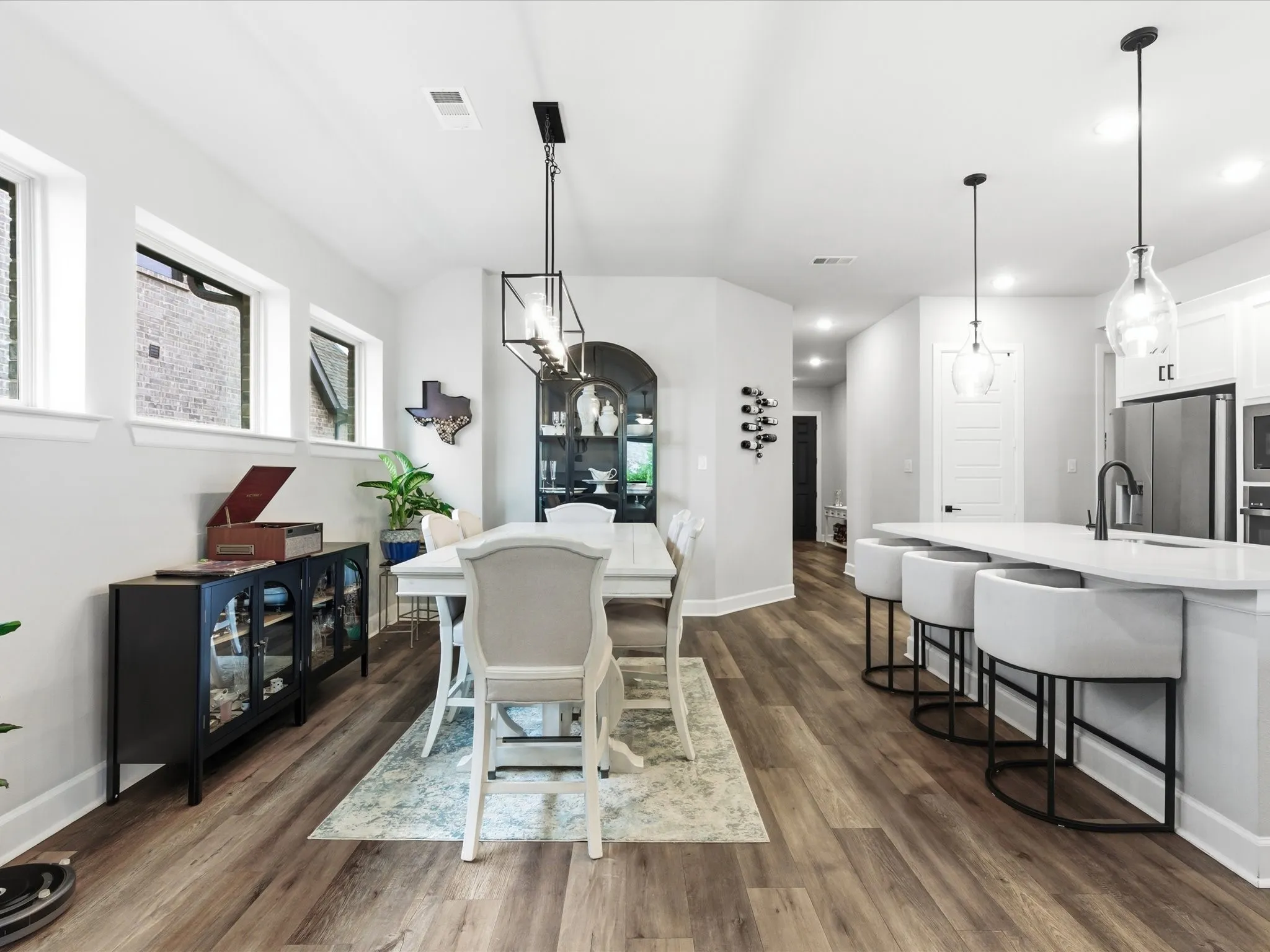 inviting dining area with a comfortable layout, creating a welcoming space for family meals, entertaining guests, and enjoying everyday moments together