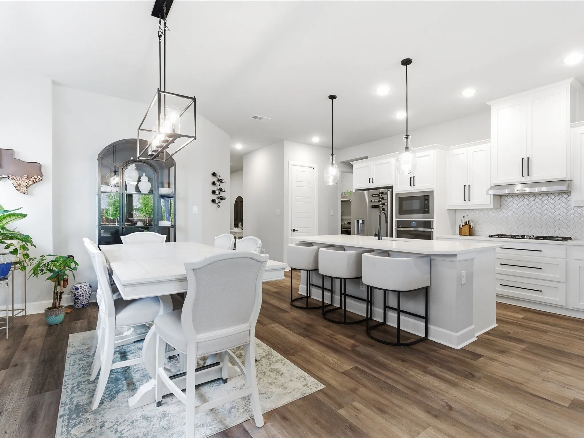 elegant dining area with a refined, spacious setting, creating a sophisticated backdrop for intimate dinners, family gatherings, and entertaining guests