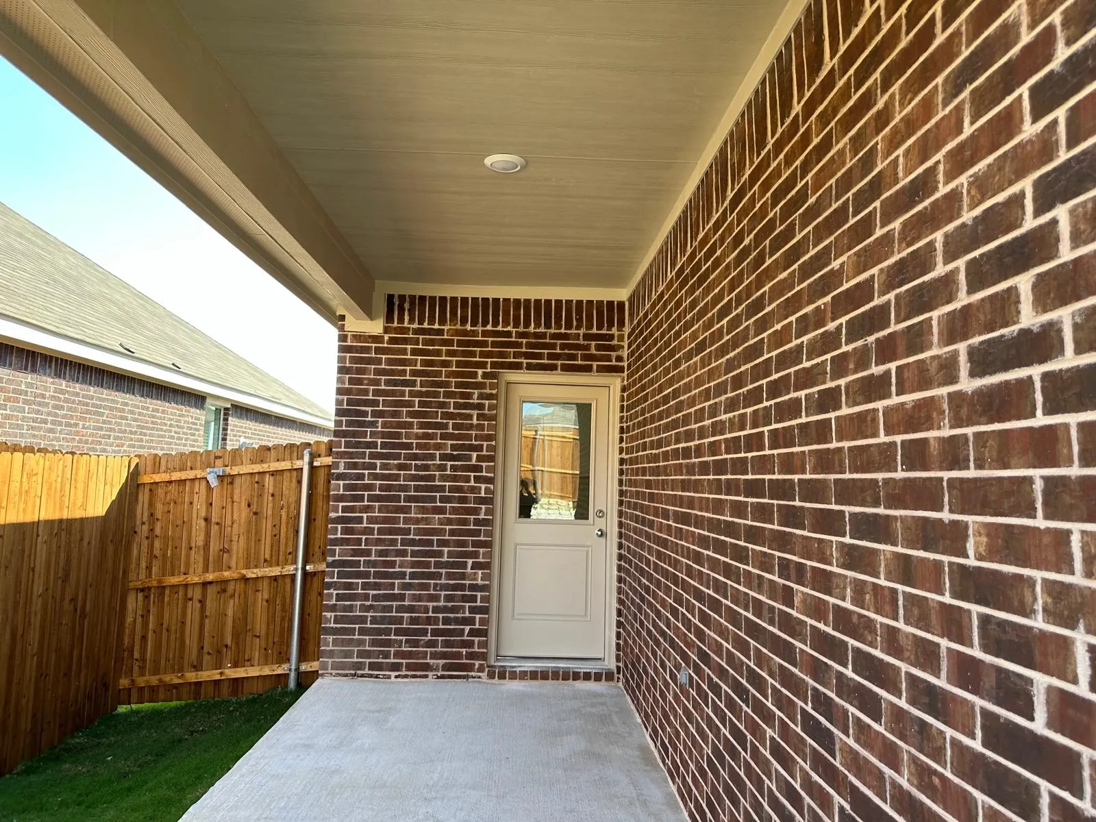 Entrance to property with a patio area