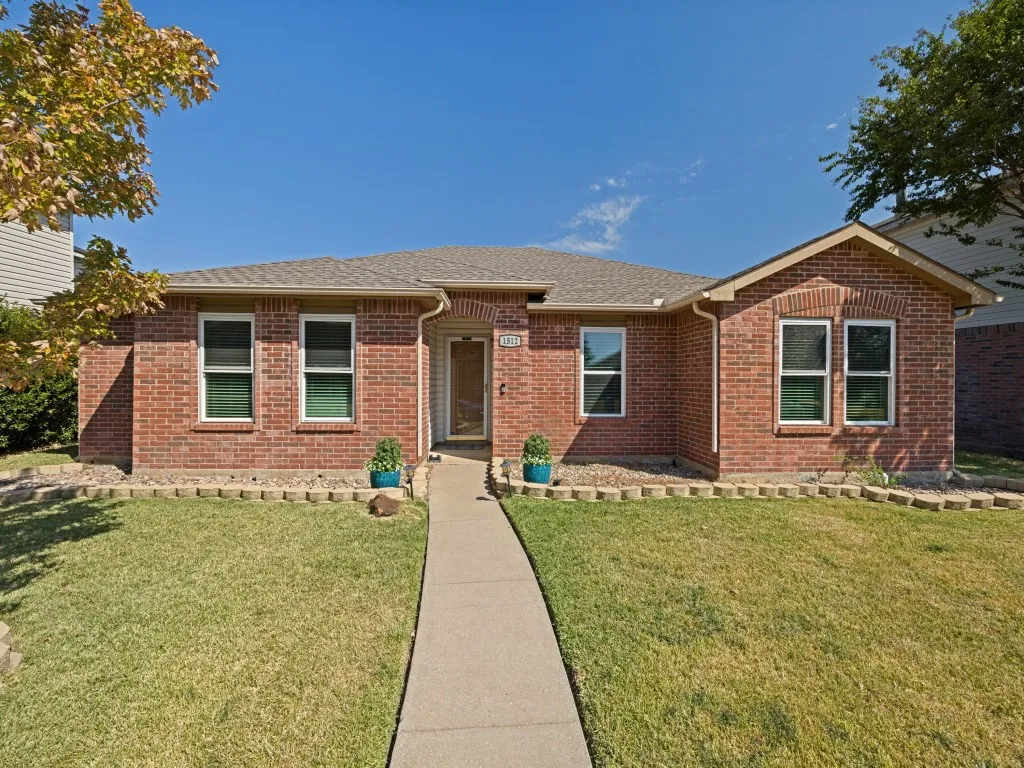 Beautiful brick home with 3 bedrooms and 2 baths. The spacious kitchen is open to the family room and the breakfast room. The family room has a cozy brick fireplace.  A 2 car garage with an additional 2 car carport. Large backyard with deck and tall cedar board on board fence with steel posts. Recently added new water heater, windows in the front and carpet in the primary bedroom.