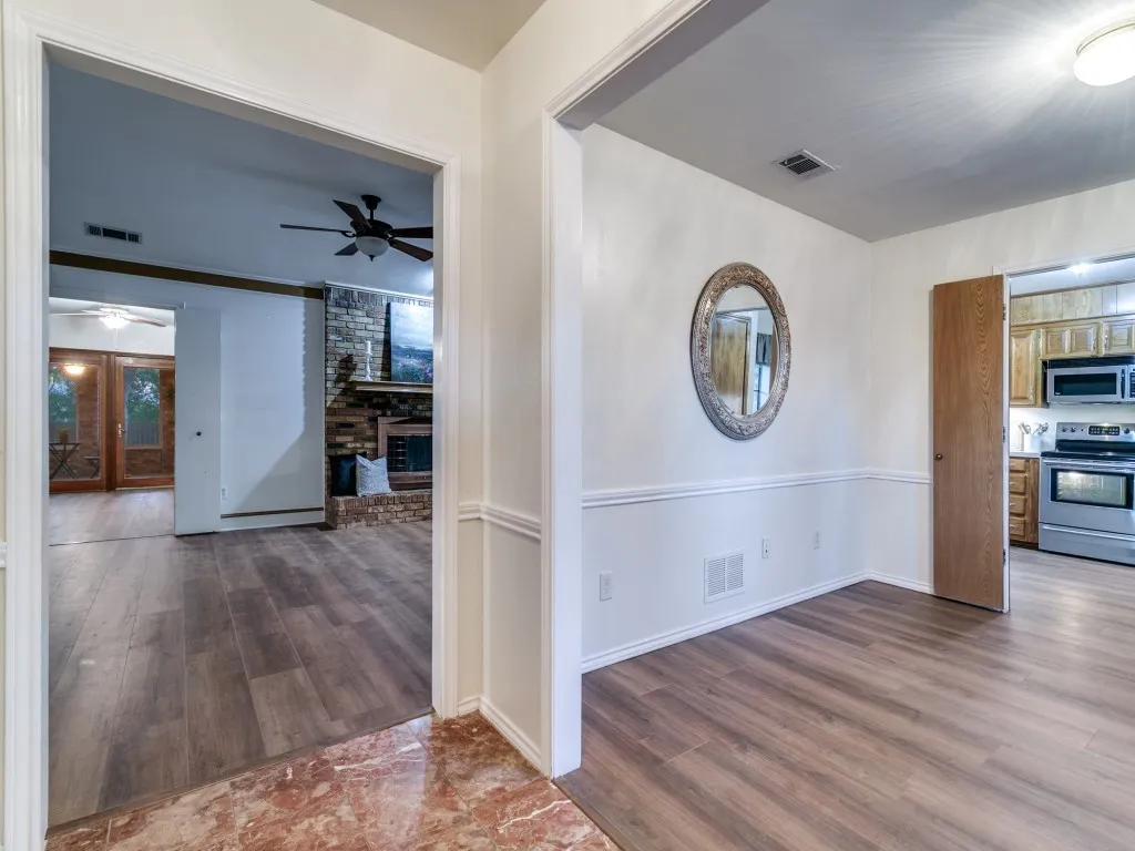 Foyer view opening into Dining & Living Rooms.