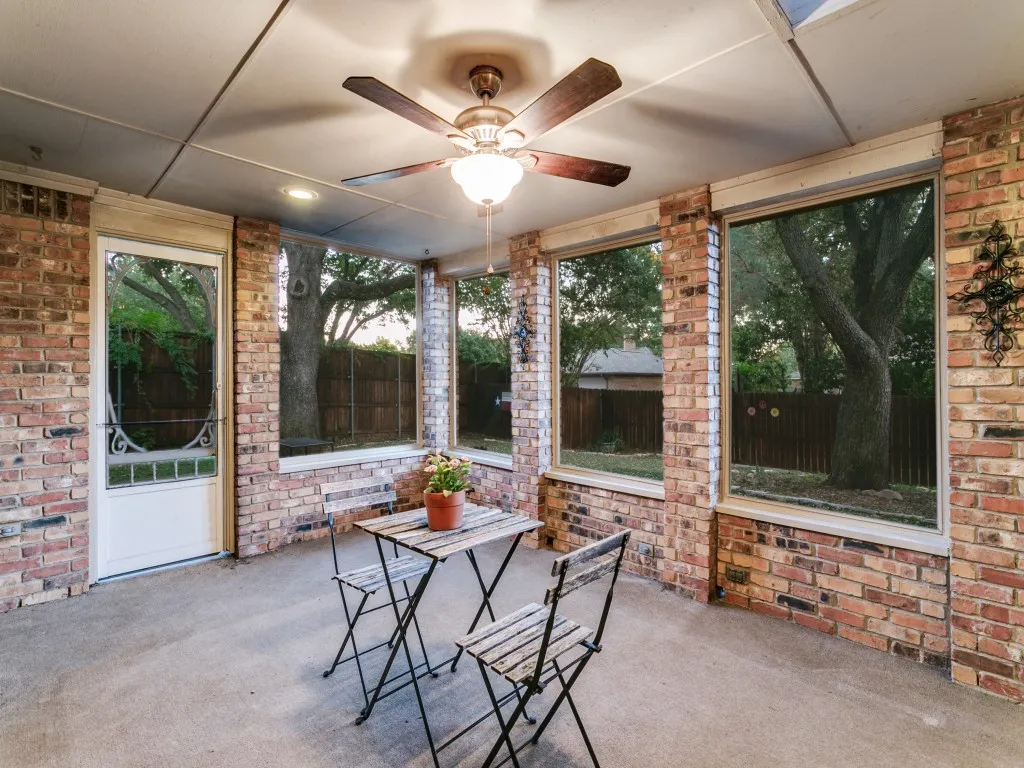 Screened-in Porch looking out to tree-shaded backyard!