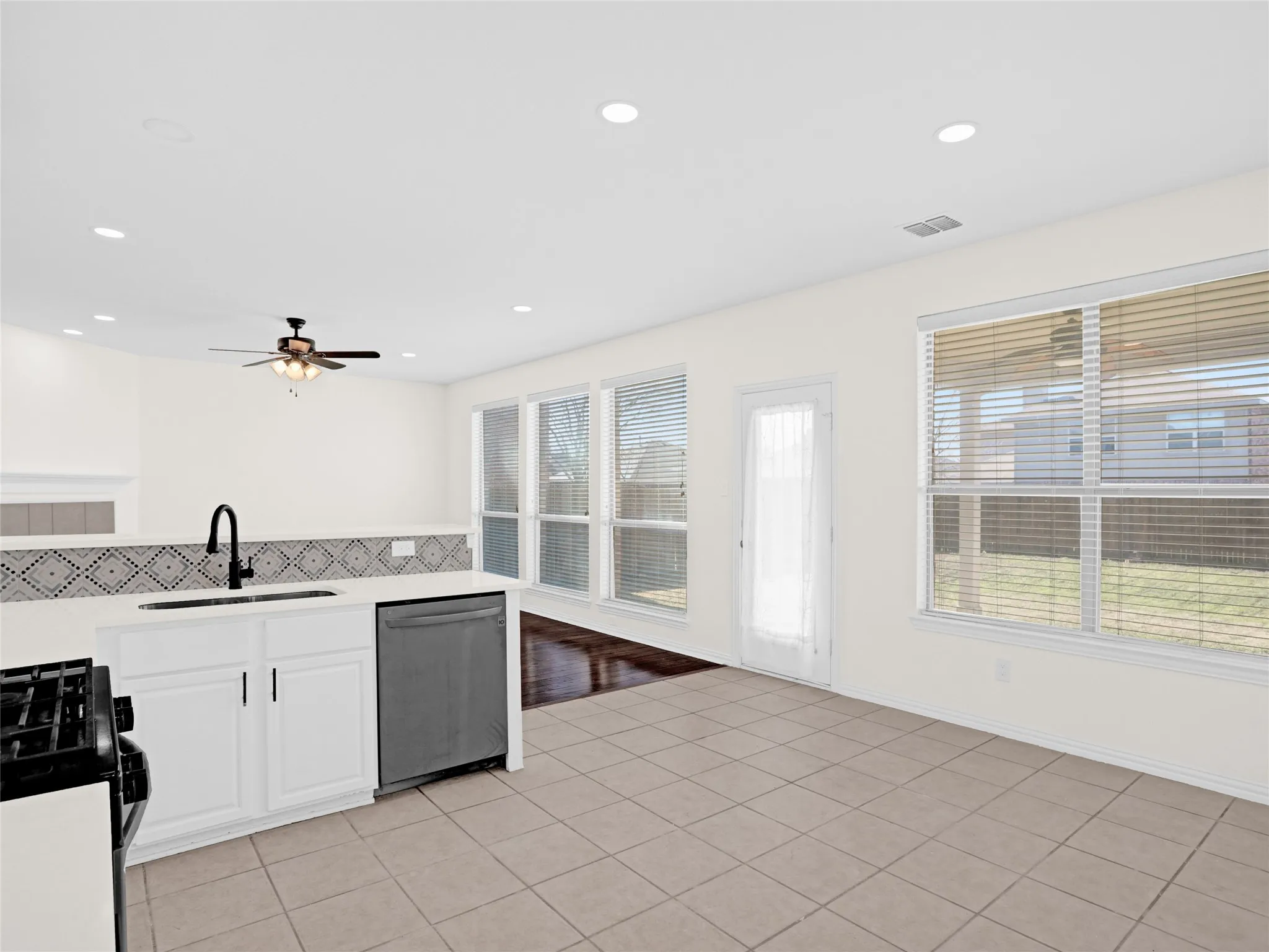 Bar top counters make a perfect 3rd eating area! You also have a large eat in kitchen space!