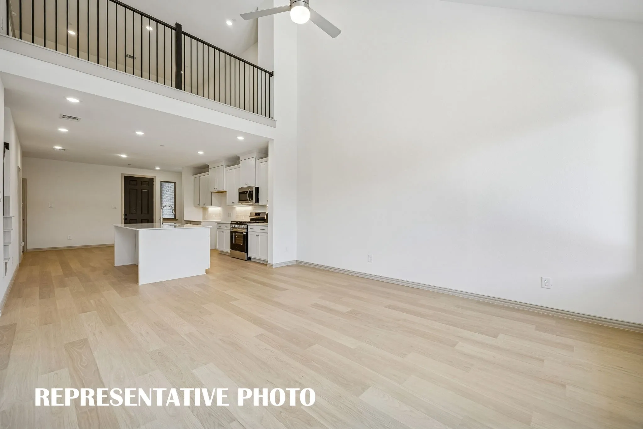 With the family room open to the game room, you'll enjoy a multi level entertainment zone in this fantastic floor plan.  REPRESENTATIVE PHOTO
