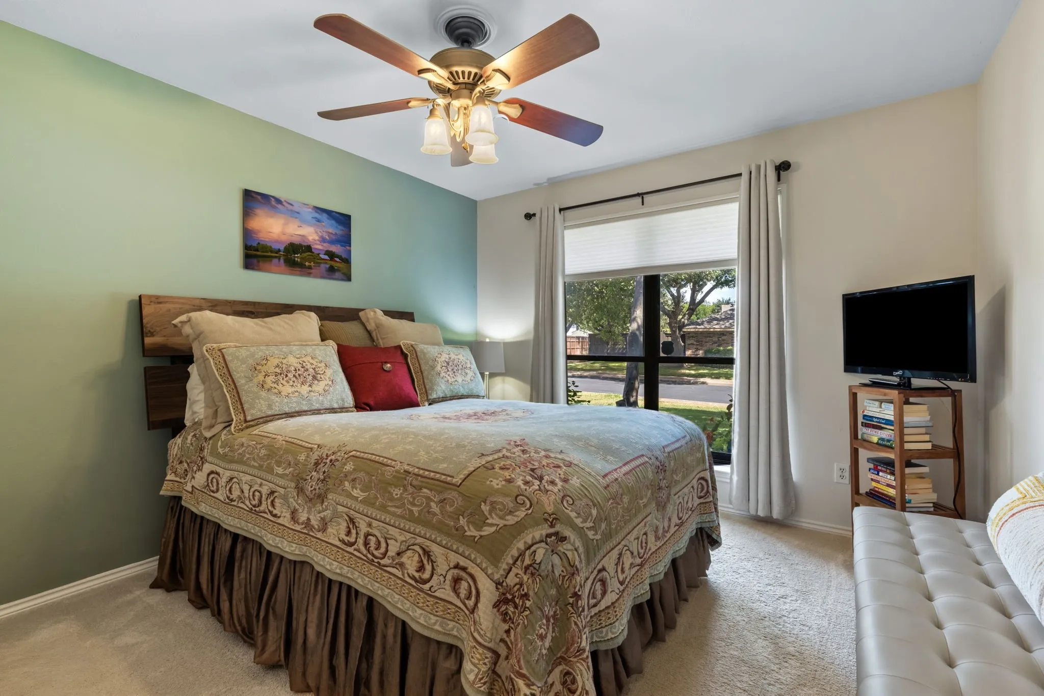 Recessed lighting with a ceiling fan, accent wall, wood-finish headboard, window with privacy blinds, and carpeted flooring