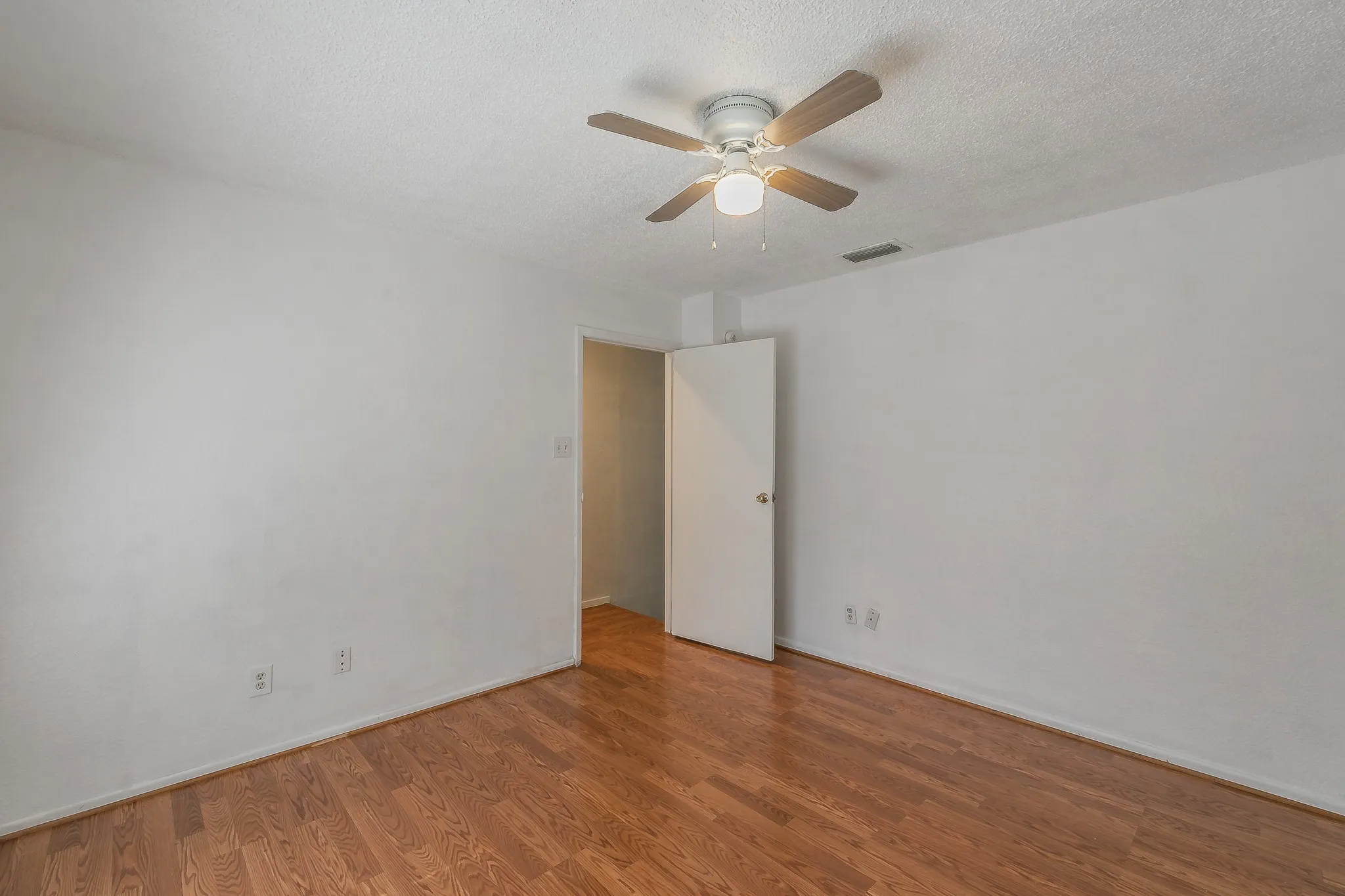 complete with ceiling fan and laminate flooring