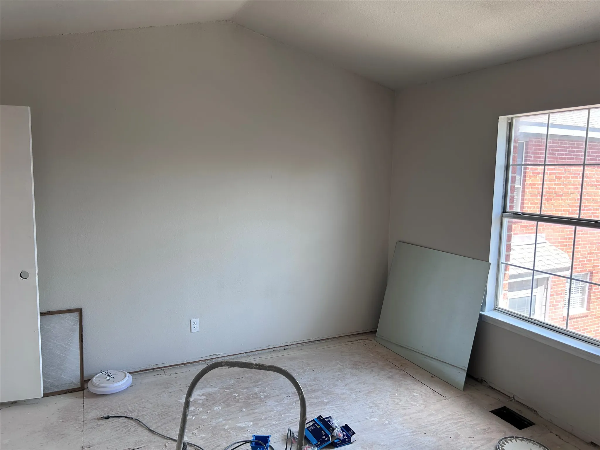 Renovations underway in one of two almost identical bedrooms. New vinyl plank flooring, ceiling fan with light, and 2" blinds are yet to come. There's multiple closets with plenty of space.