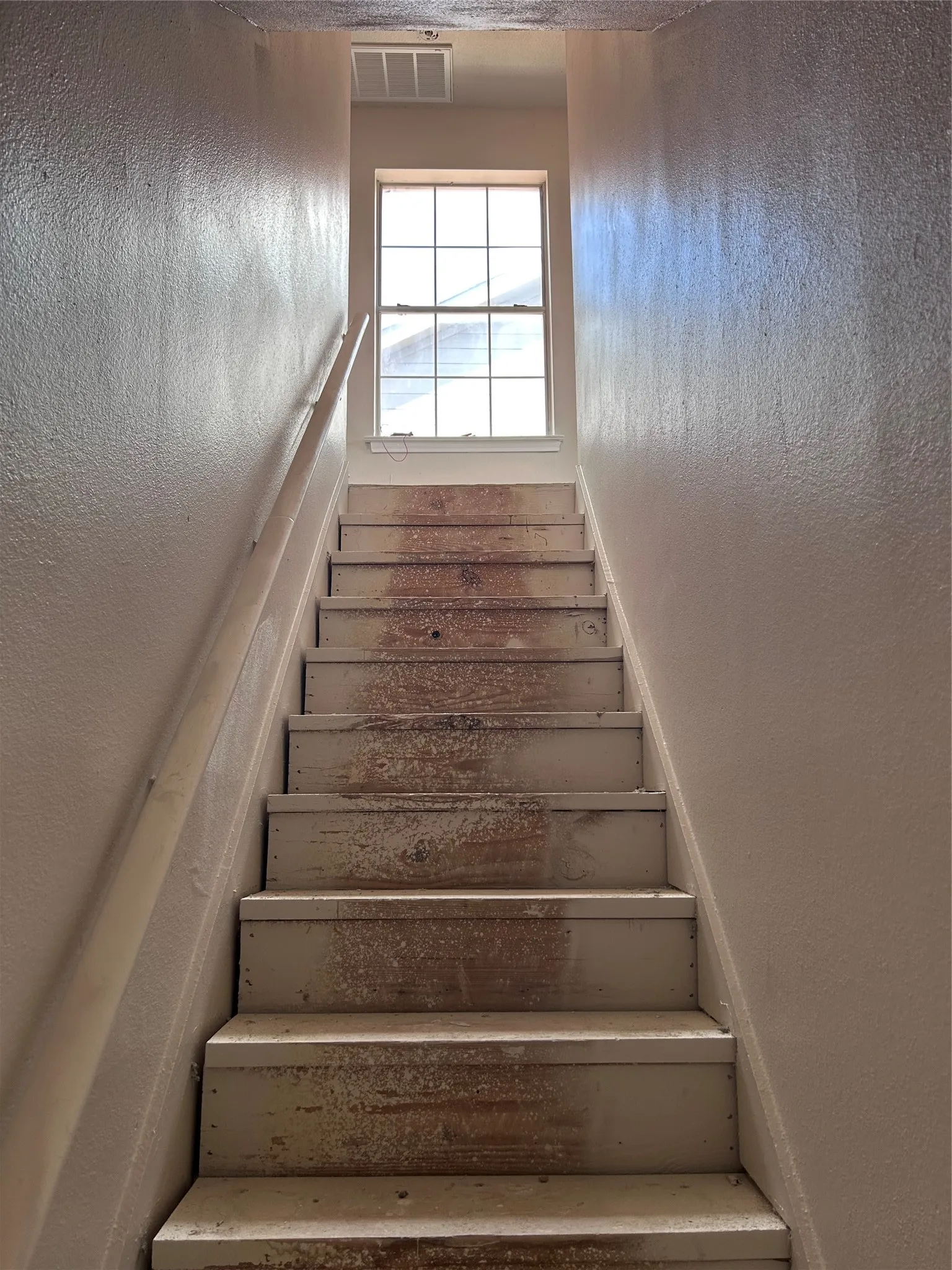 The stairs.  Vinyl plank flooring will be added.