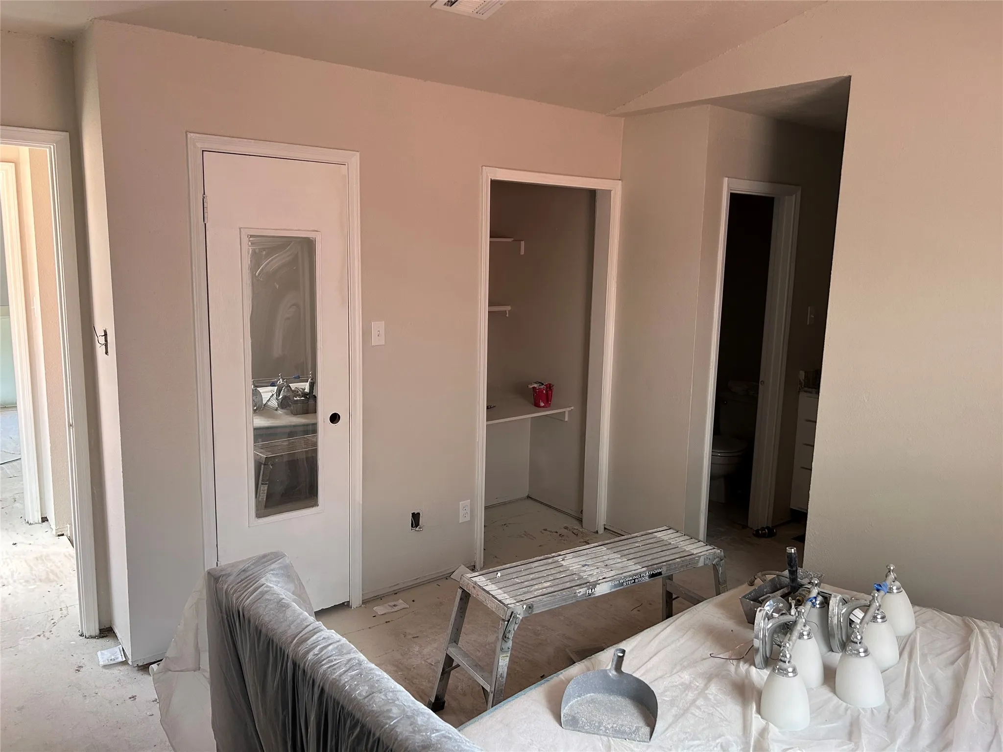 Renovations underway in one of two almost identical bedrooms. New vinyl plank flooring, ceiling fan with light, and 2" blinds are yet to come. There's multiple closets with plenty of space.