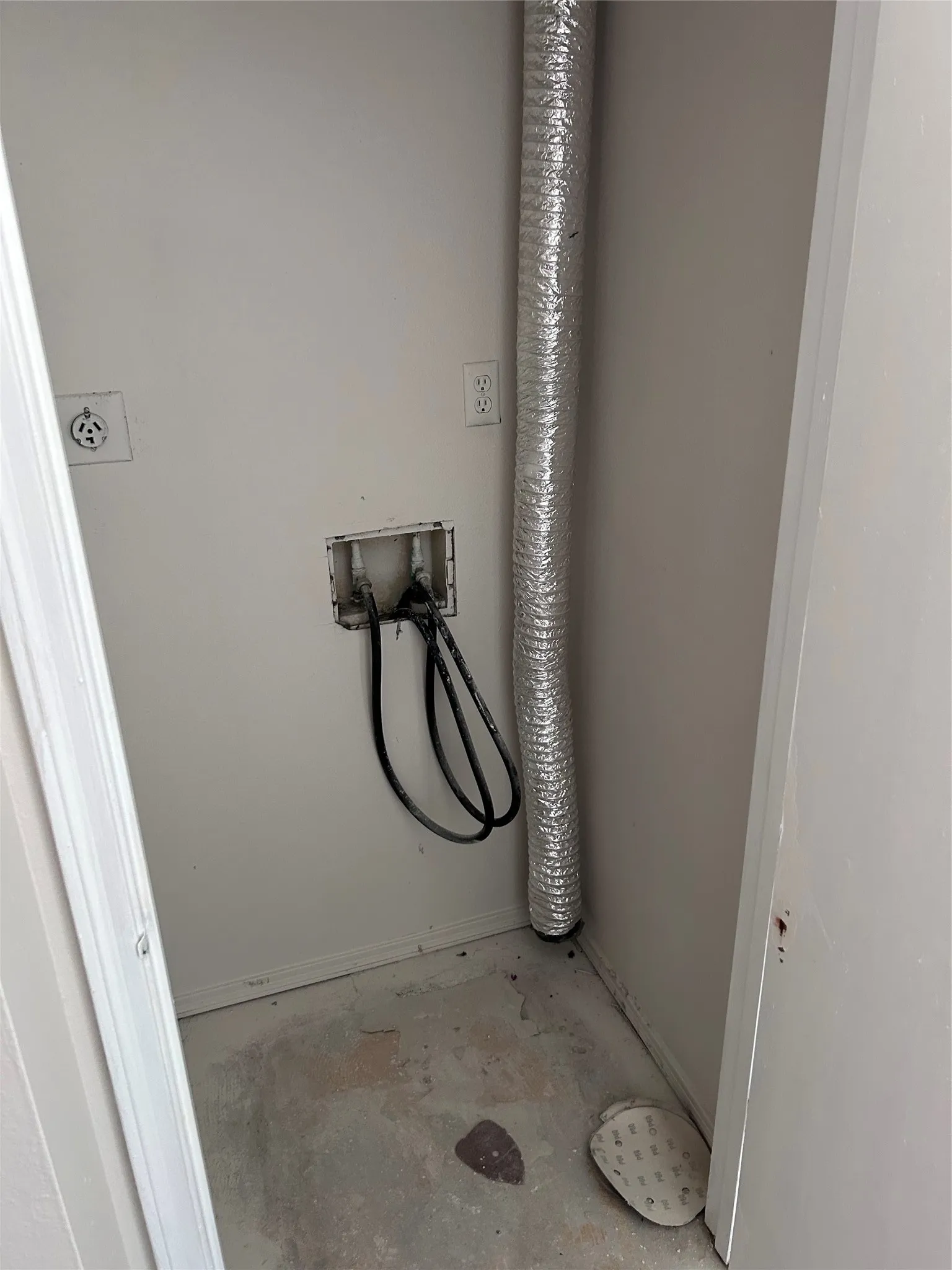 The main floor laundry closet will have vinyl flooring. The washer and dryer are included.