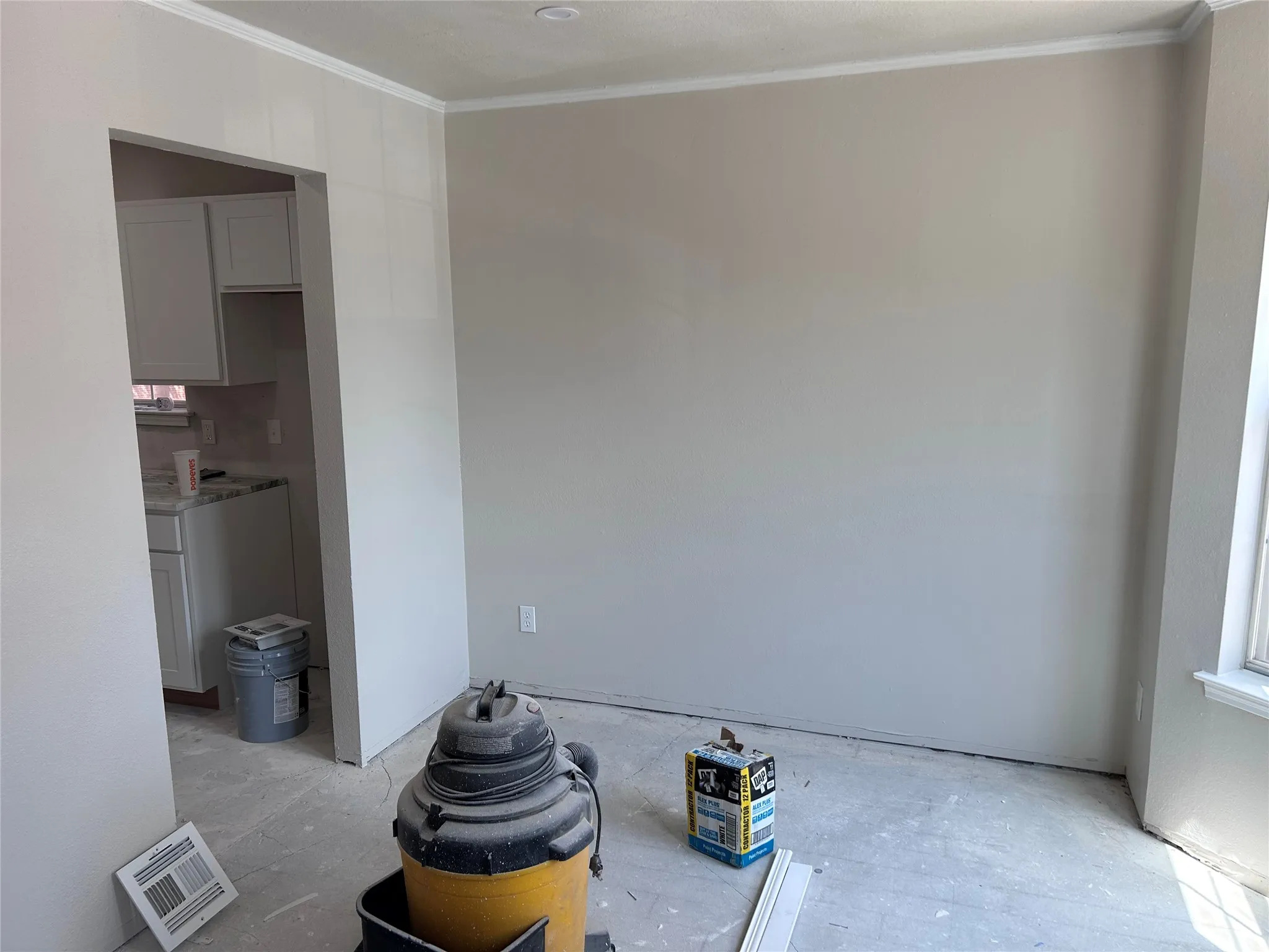 Renovations underway in the dining room with new recessed lighting. New vinyl plank flooring and 2" blinds coming soon.