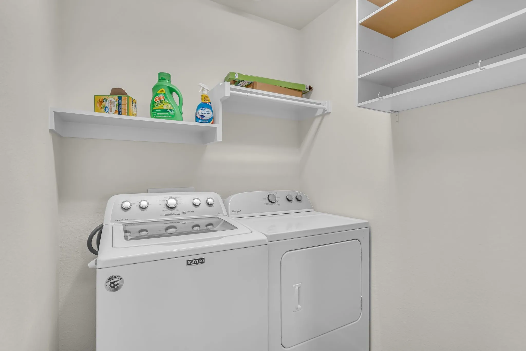 Separate Utility Room Provides Convenient Shelving Areas.
