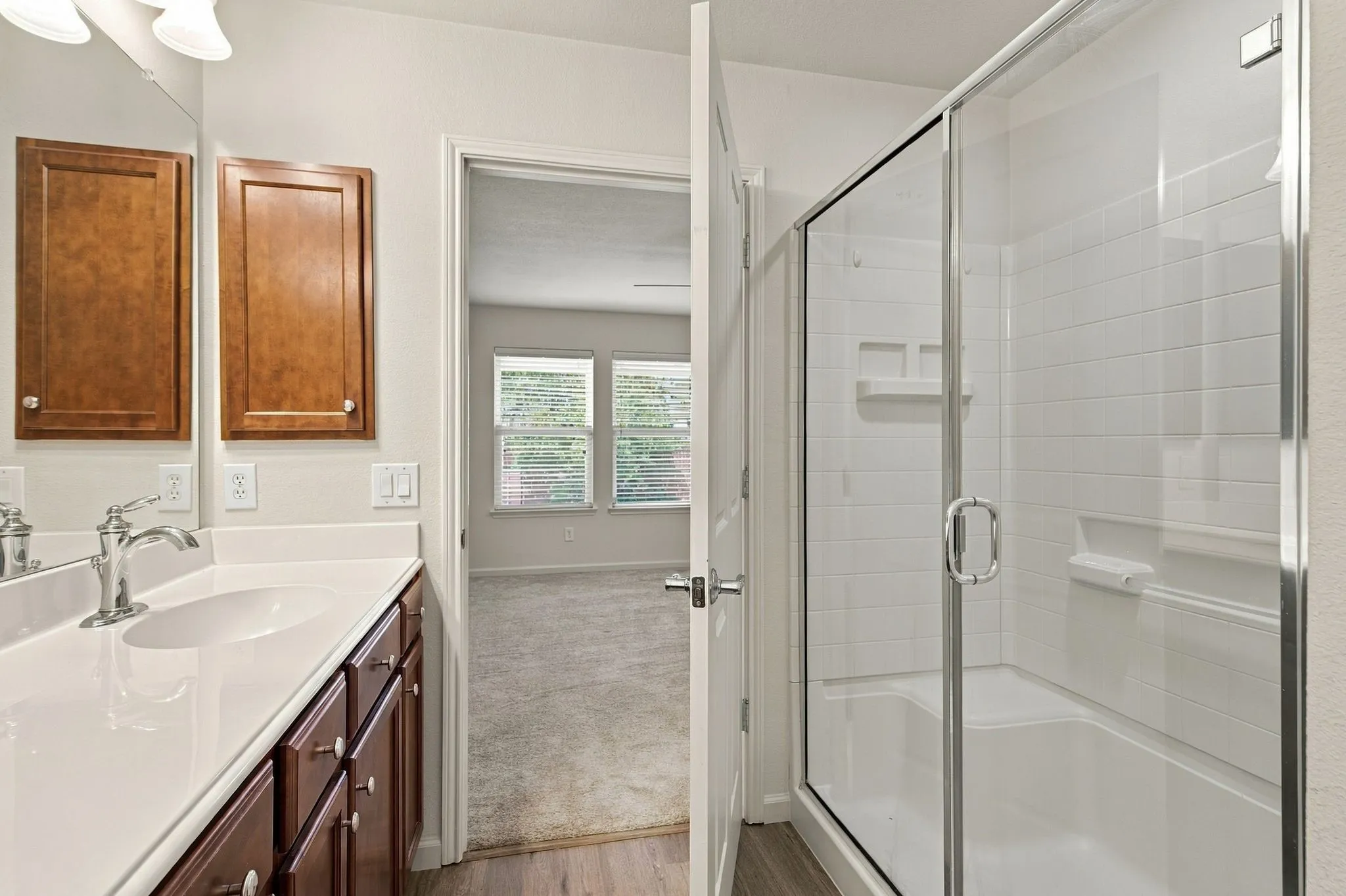 You'll Appreciate The Two Convenient Seating Areas In The Walk-In Shower.