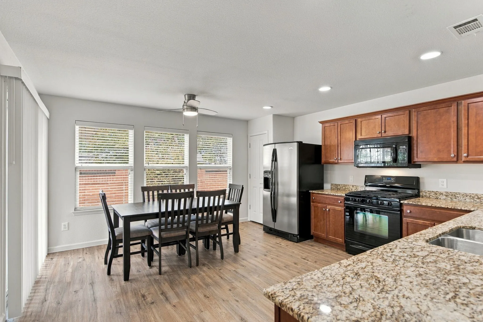 Sizable Eat-In Kitchen Provides Ample Space For Meal Preparation, Dining And Entertaining Neighbors And Friends.