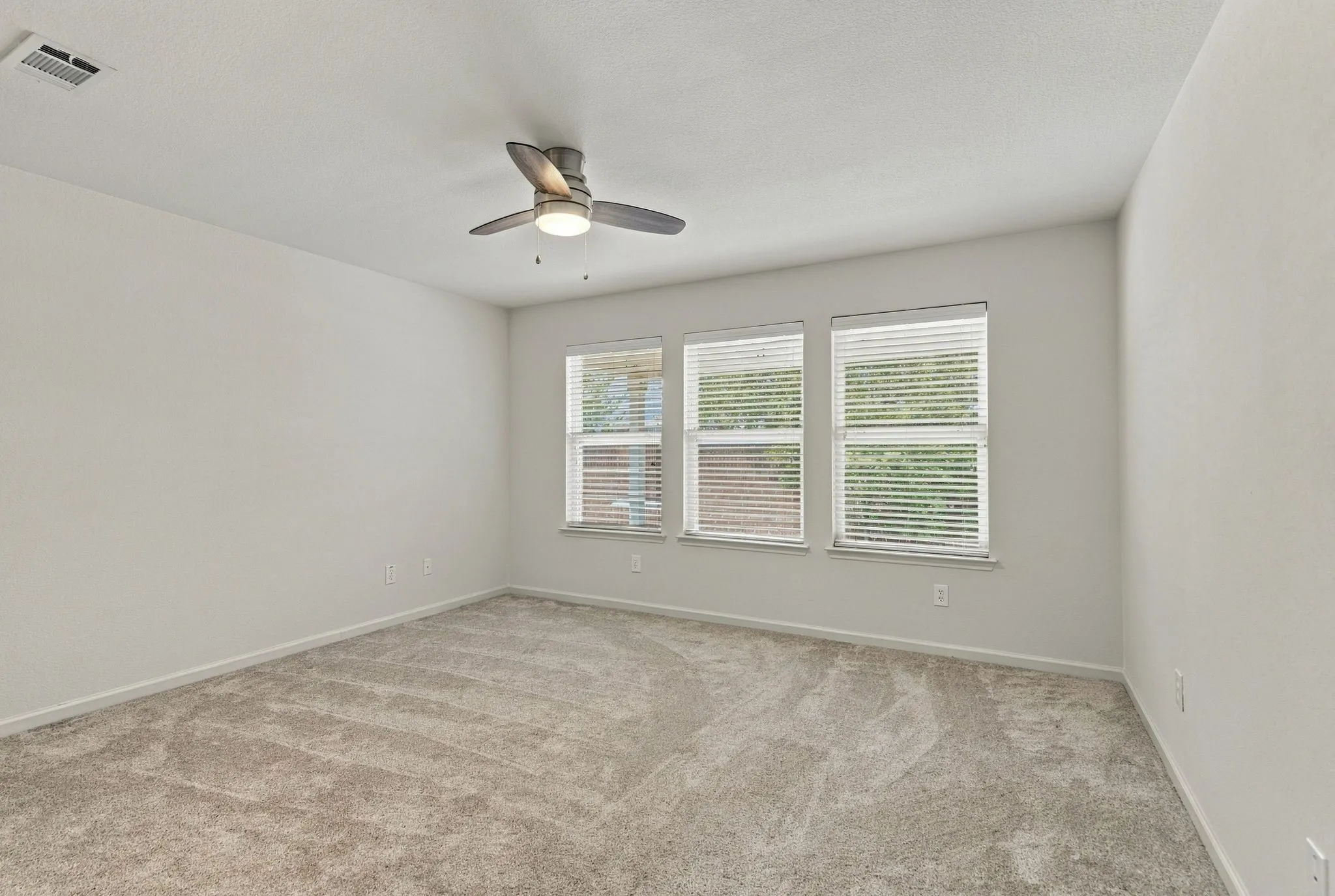 In The Owner's Suite, The Window Views Create Spaciousness And A Designer Ceiling Fan Provides Comfort.