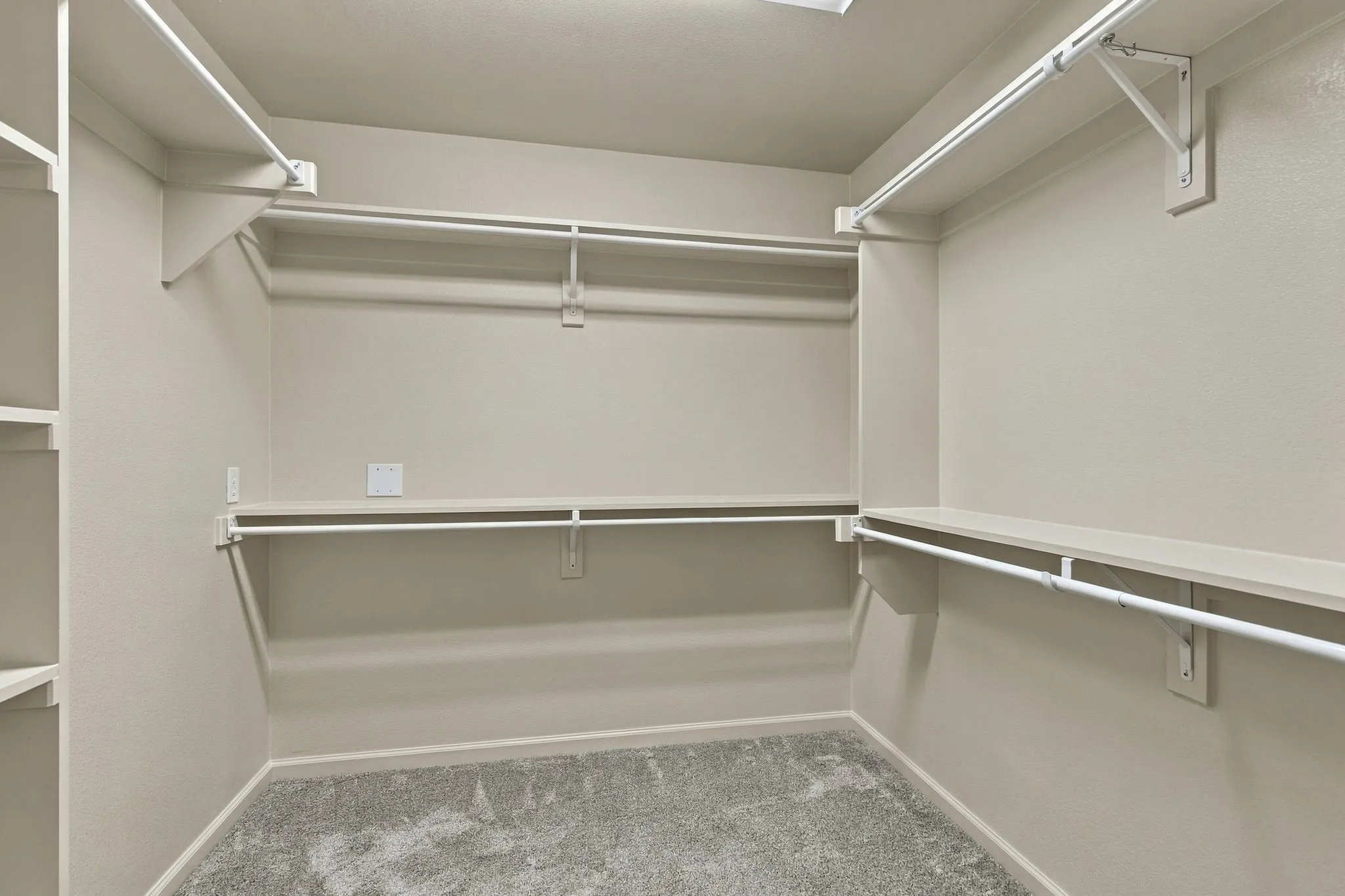 The Spacious Owner's Suite Closet Accommodates All Seasons Of Clothing.