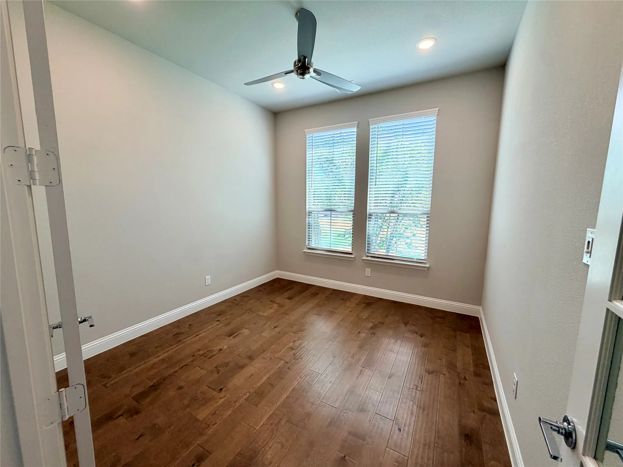 Wood-finish flooring with crisp white trim
