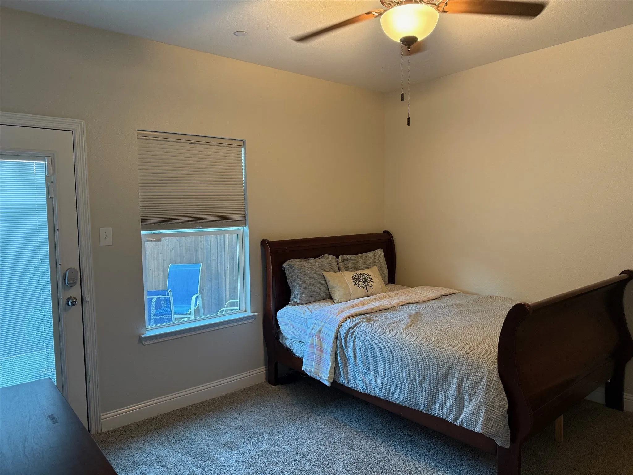 1st Floor Bedroom with French door to patio.