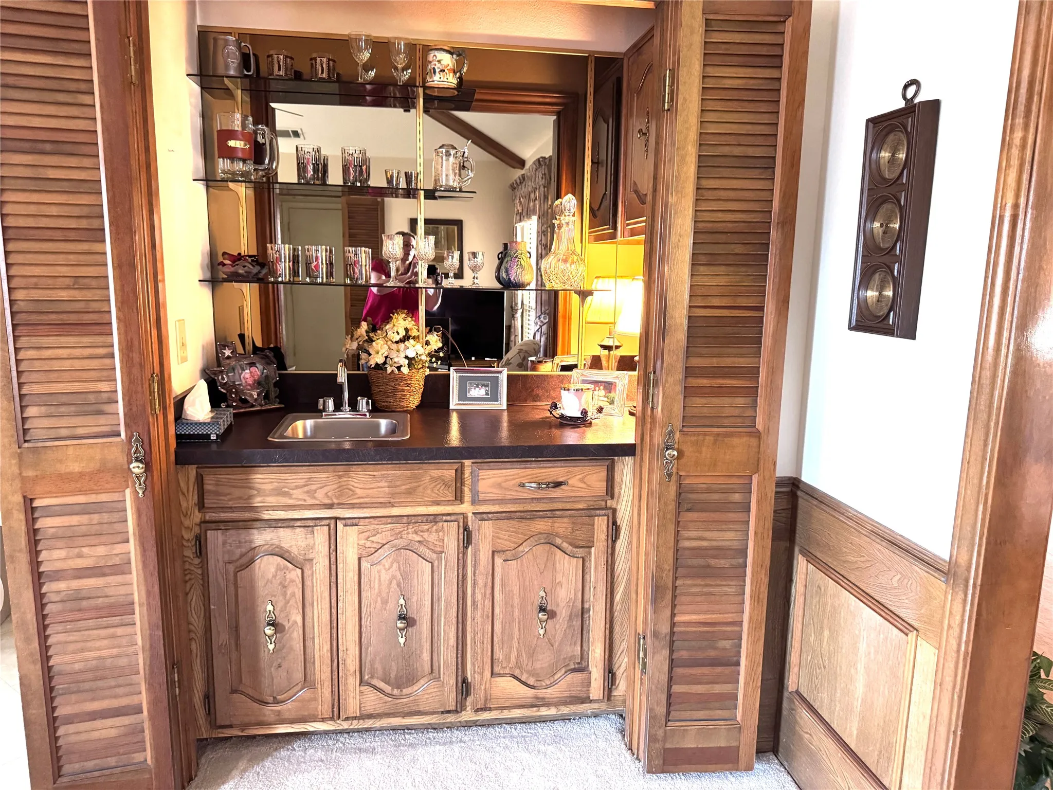 The Bar is located in the Den.