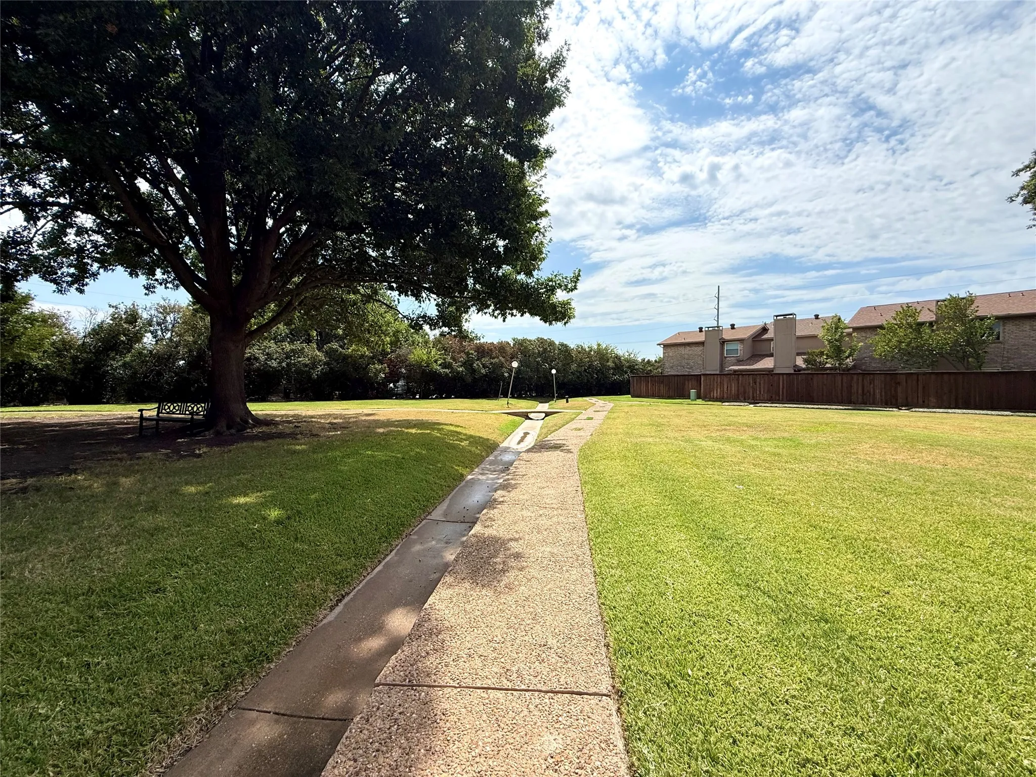Enjoy the outdoors with spacious green areas, mature trees, and walking paths