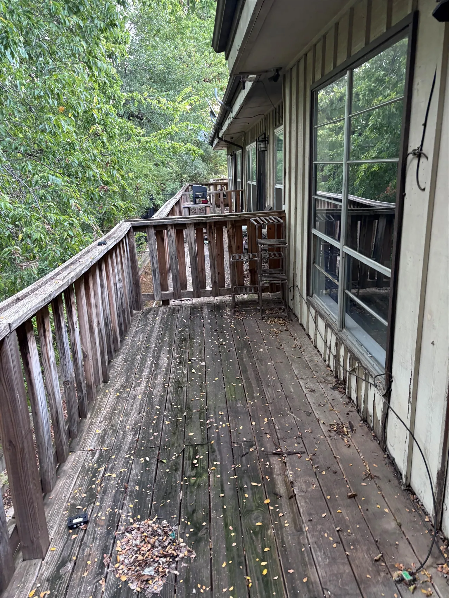 Wood-plank outdoor decking with wood railing