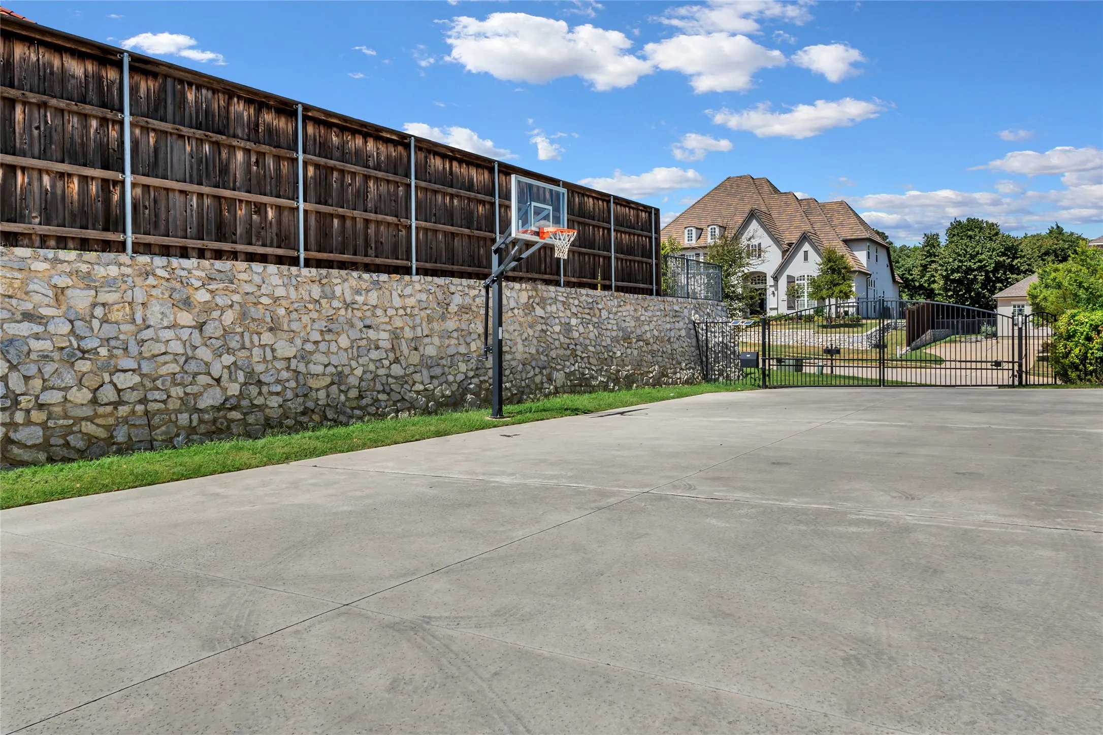 Exterior basketball hoop on a concrete court