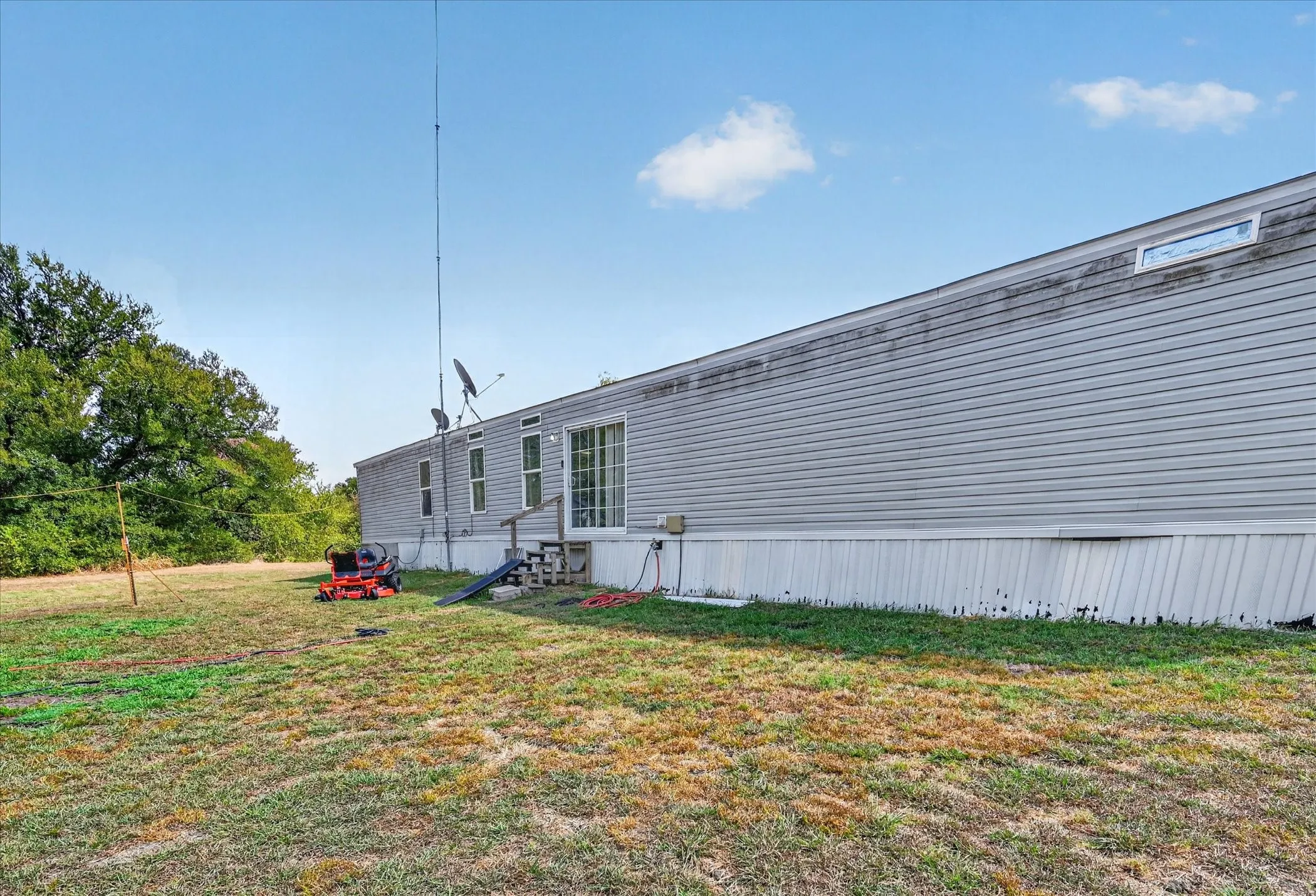Mobile Home For Sale in Fannin County , 913 County Road 4232, Bonham, Texas 75418, 3 Bedroom, 2 Bathroom, Garage spaces, 1,216 Sqft, built in 2016, mls#21386473, Real Estate Agent in Bonham, Homes For Sale in Fannin county, Homes For Sale in Bonham, Realtor in Bonham Texas, Real Estate Brokerage Independent Realty Texas, Luminita Cordes Realtor