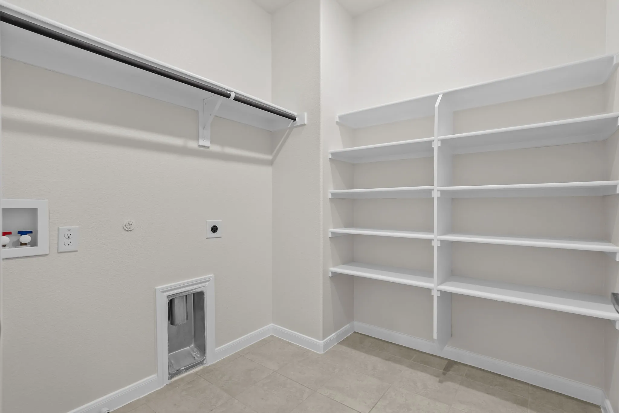 Spacious utility room on second floor