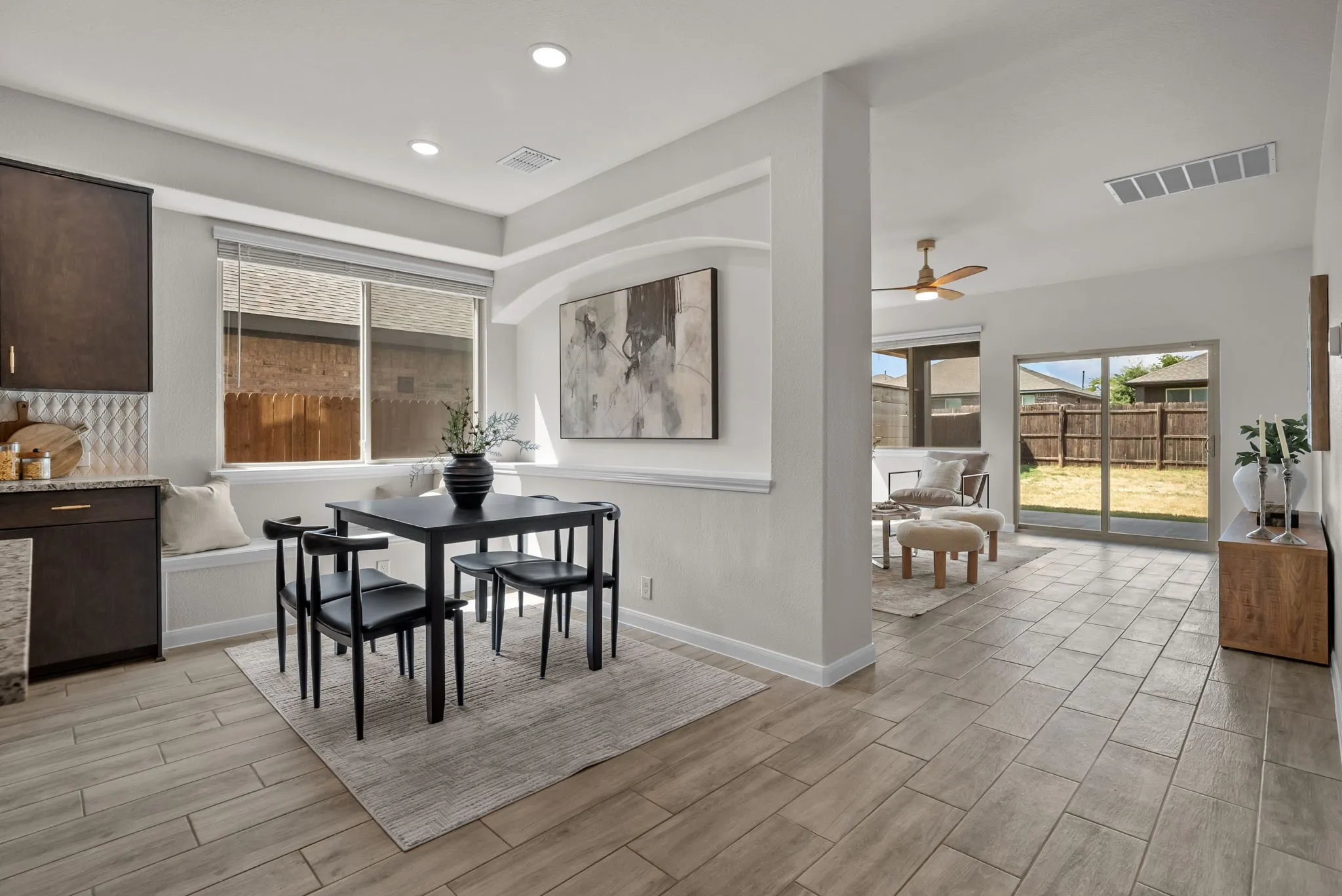 Custom accent wall separating living and dining spaces